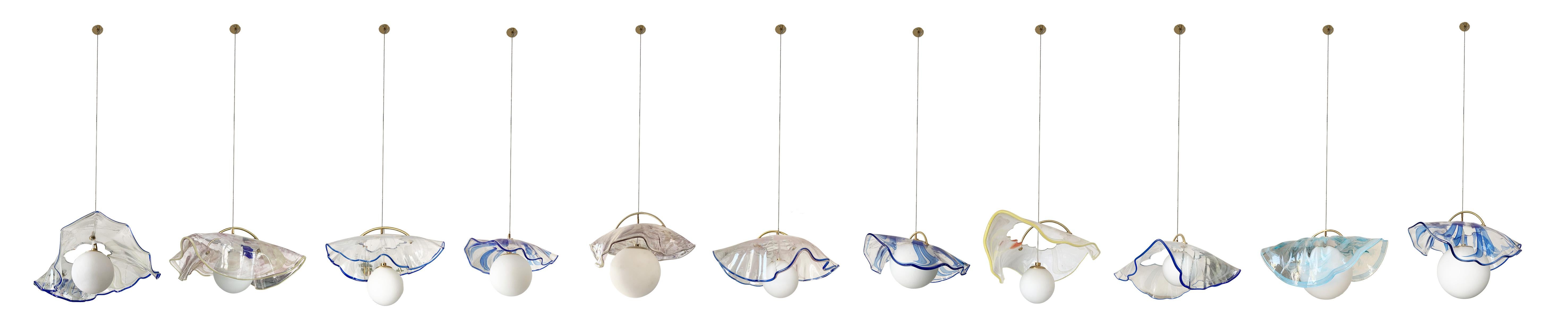 Jellyfish pendant lamp by Sema Topaloglu.

Jellyfish lamps are a collection, the price is for 5 items.

This product is hand-crafted therefore each production is unique and might not be exactly the same as visual.

 Lighting was part of the