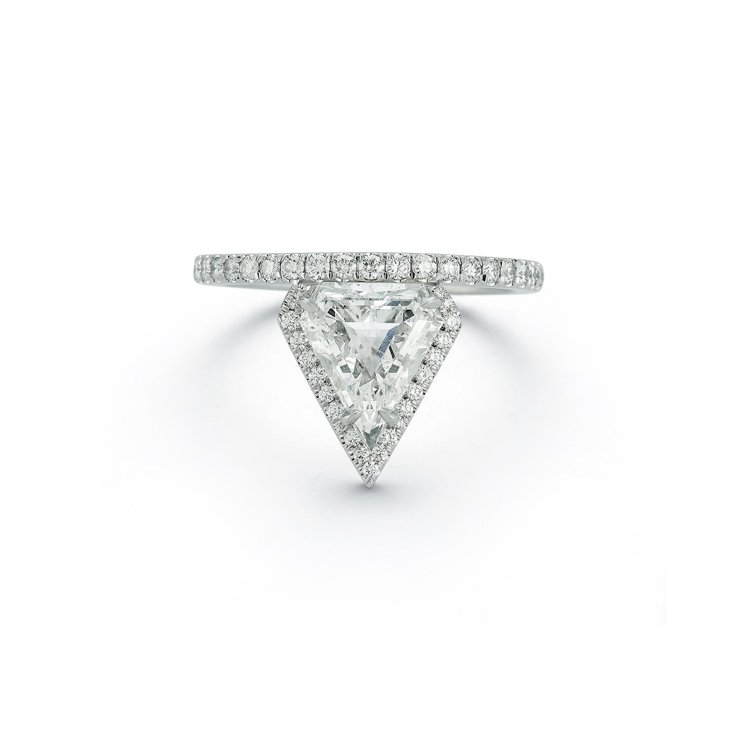 Our Diamond Shield Isadora Ring is truly one-of-a-kind. Boasting a gorgeous rare white diamond shield center stone with hand set micro-pave diamonds around and on the band. 
At Jemma Wynne, we believe fine jewelry is an expression of self. Our world