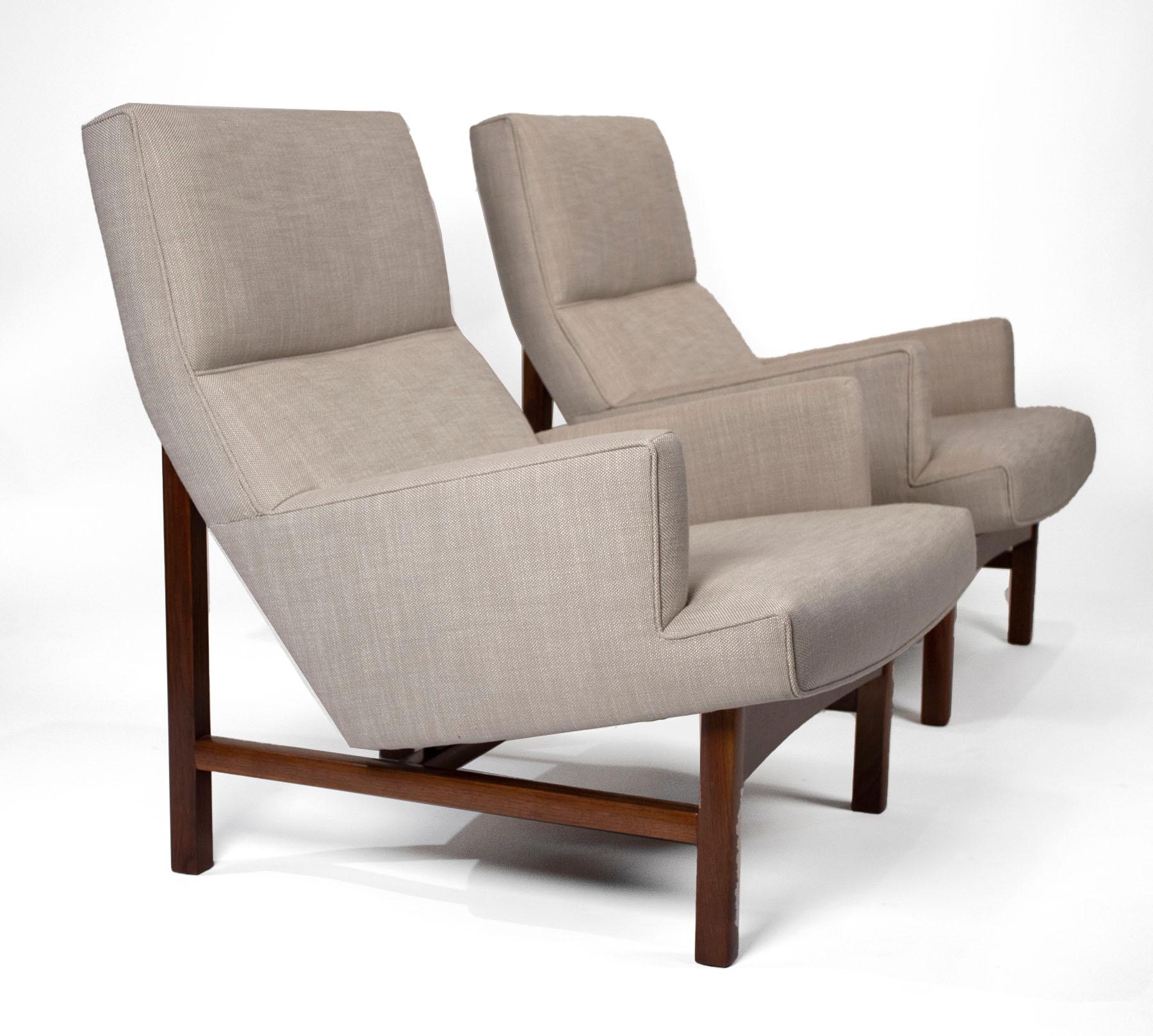 Georgeous pair of Jens Risom lounge chairs with solid walnut frames. Very comfortable and restored to the highest possible standard. 

A third chair is also available as a single.

