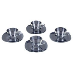 Jena-Glas, Schott & Gen/Mainz, Germany. Four coffee cups with saucers.