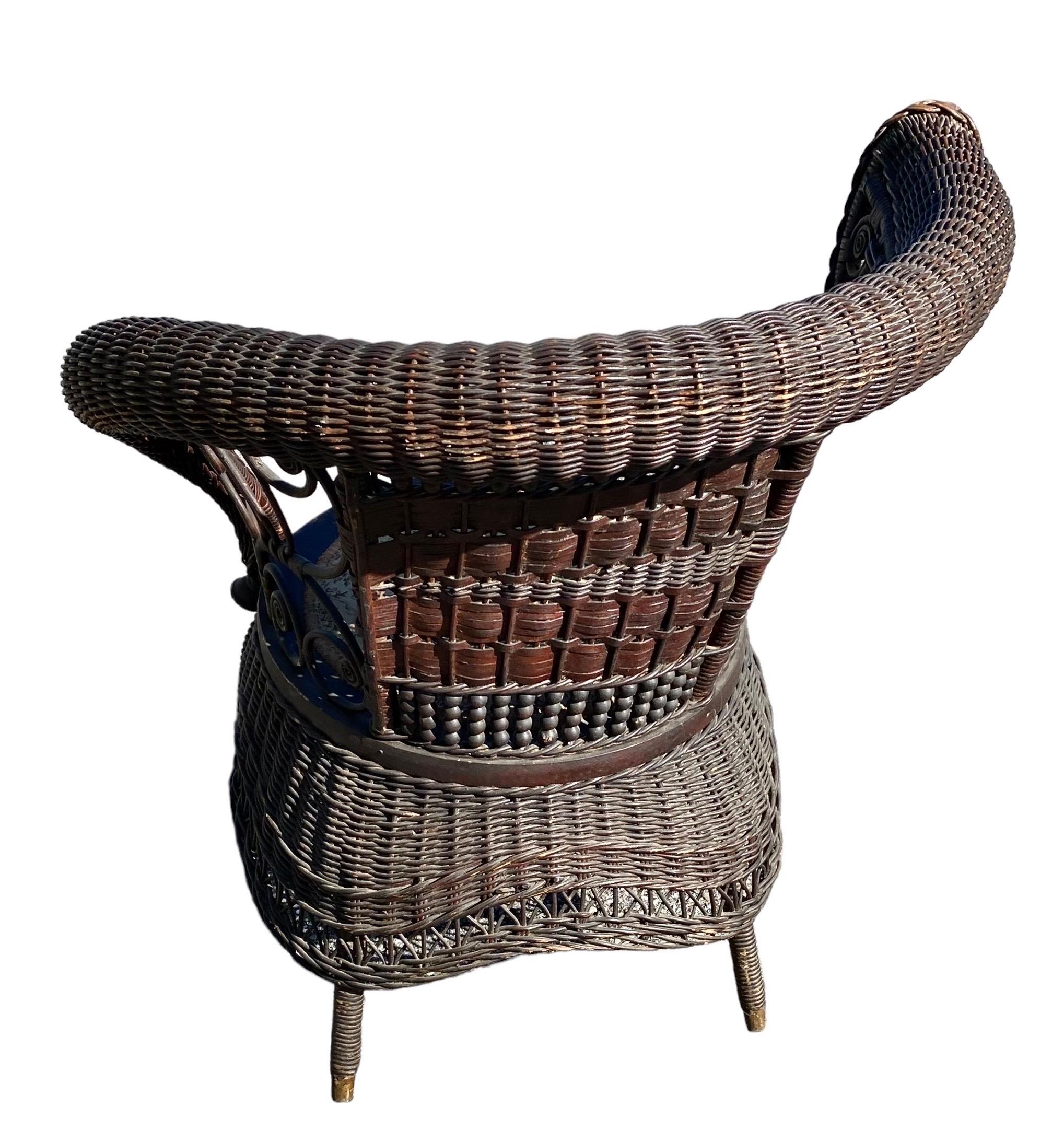 Hand-Woven Jenkins & Phipps Stick and Ball Wicker Portrait Chair For Sale