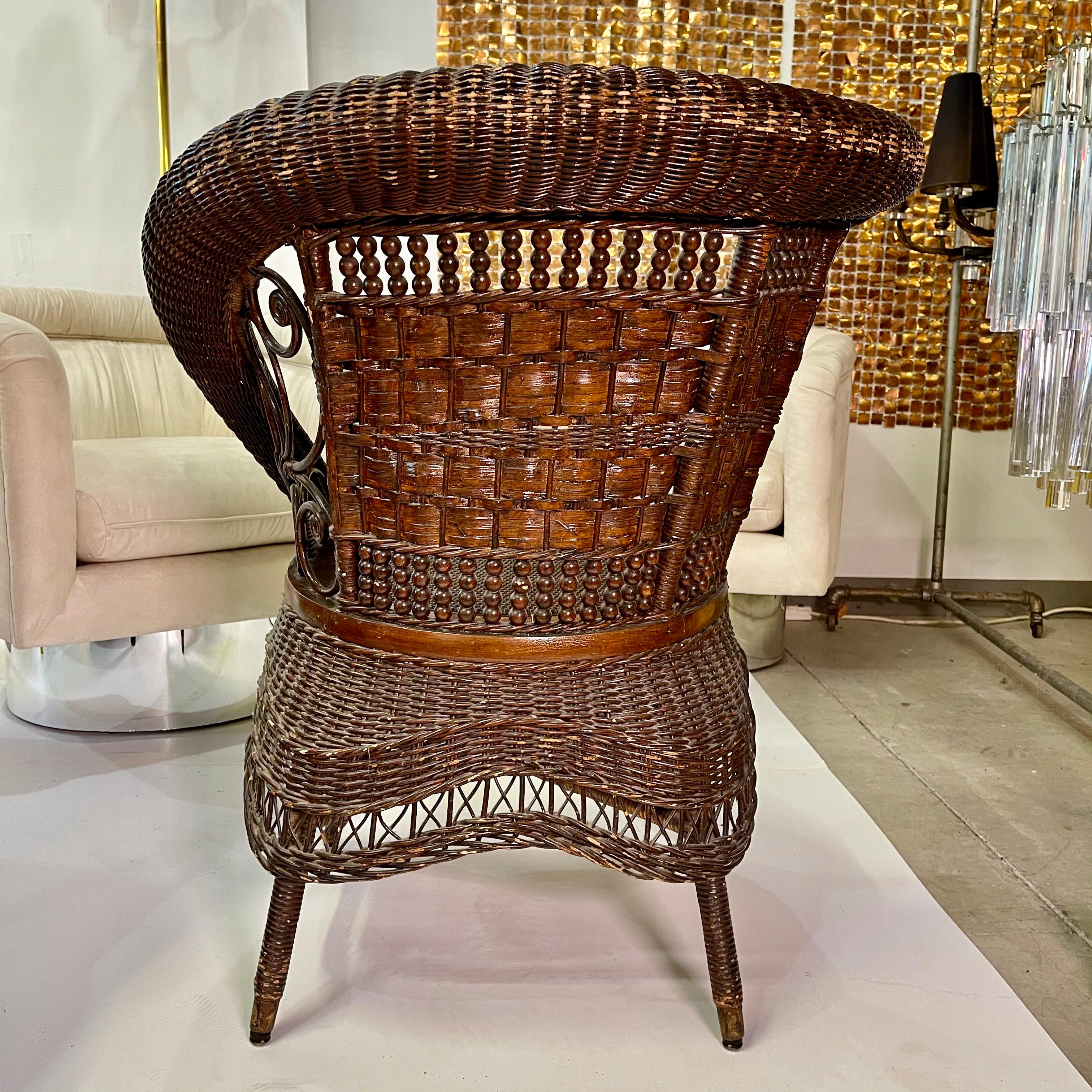 American Jenkins & Phipps Stick and Ball Wicker Portrait Chair For Sale