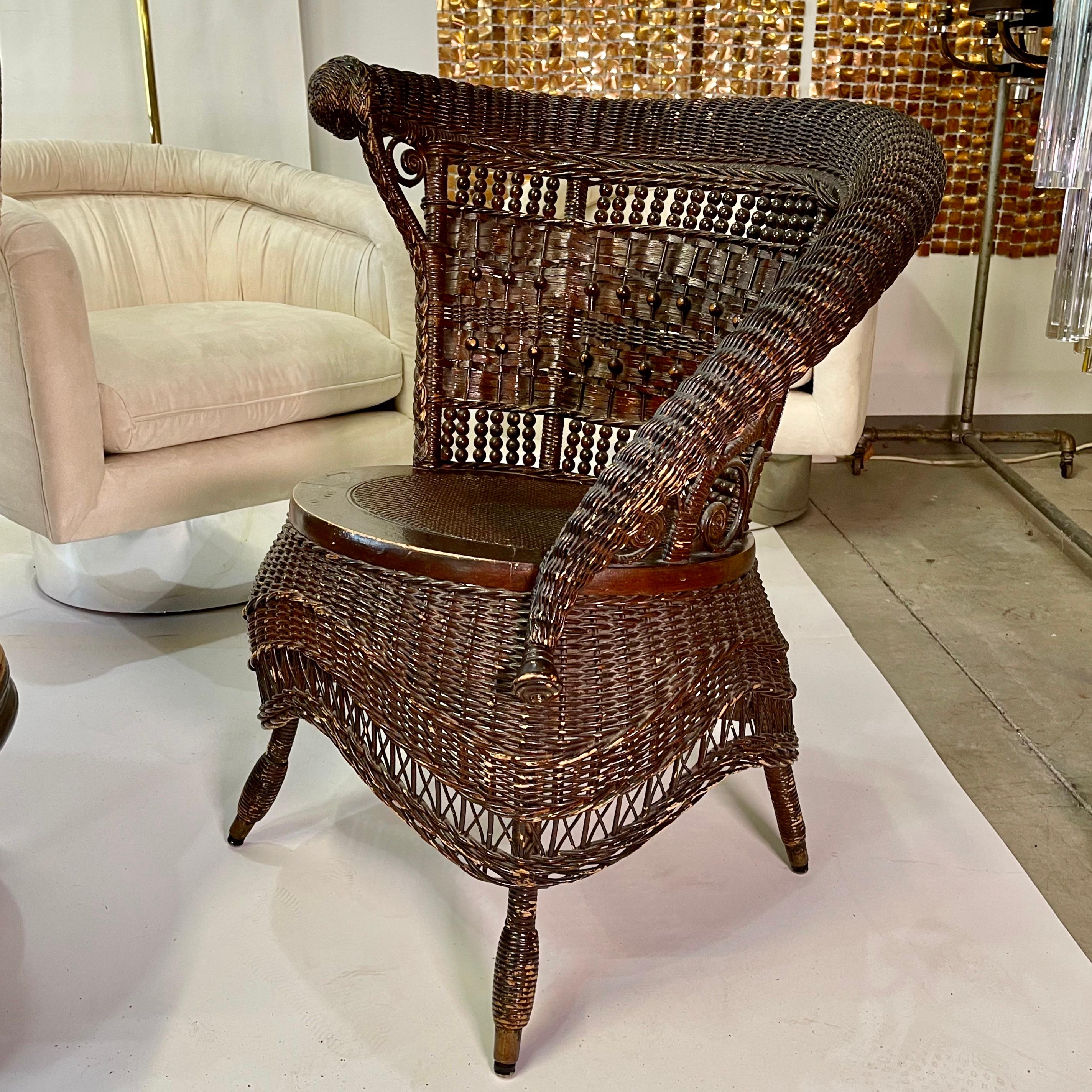 20th Century Jenkins & Phipps Stick and Ball Wicker Portrait Chair For Sale