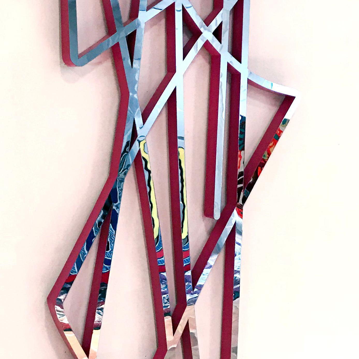 Jenna's piece is a stainless steel sculpture, with enamel painted sides. 

Jenna’s abstract style and emphasis on color and  movement through linework seeks to allow each pieces’ audience a unique reconstruction of context in which each work is