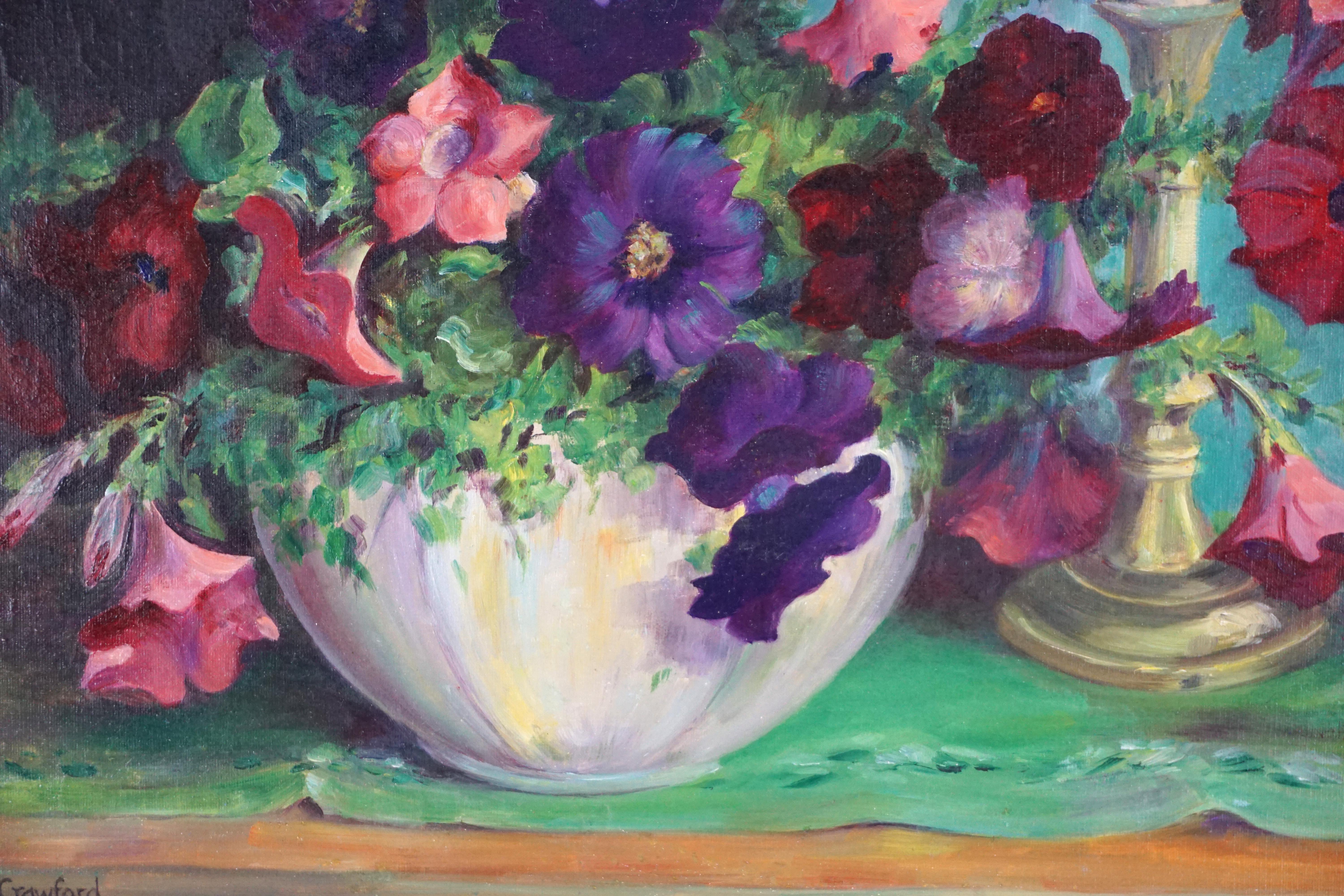 1930s Vibrant Floral Still Life with Petunias and Candle Stick - American Impressionist Painting by Jennie Thatcher Crawford