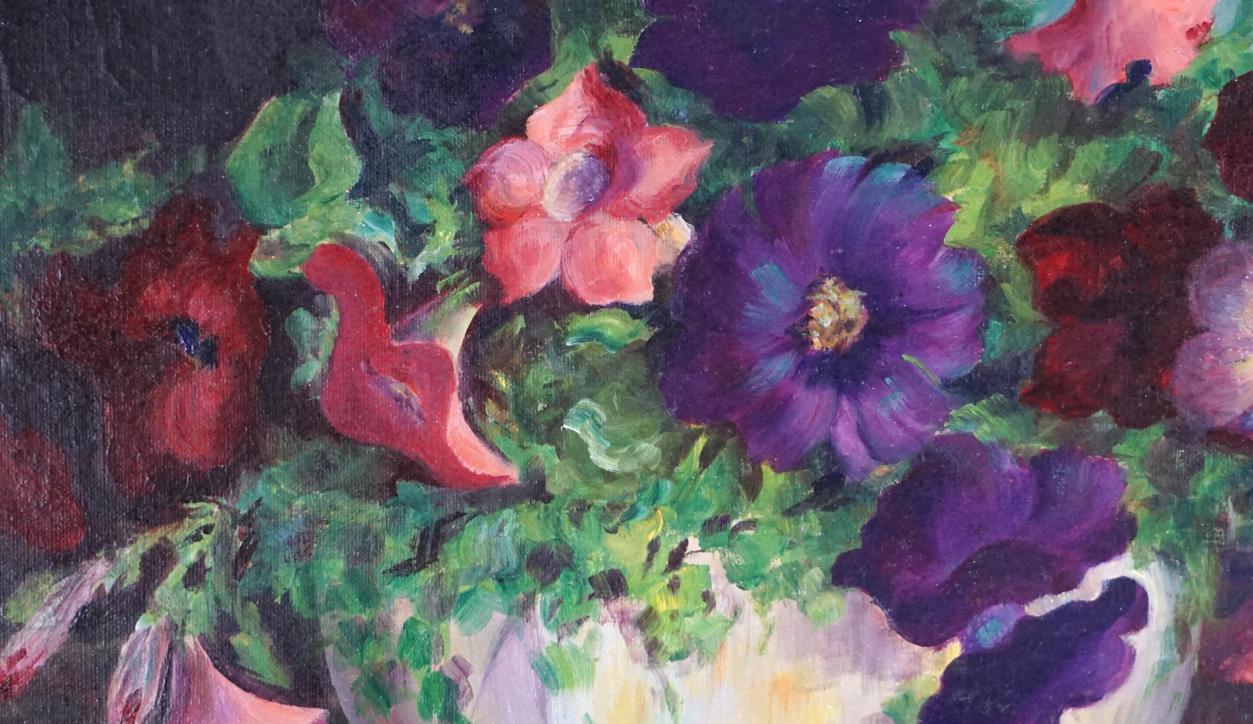 Wonderfully vibrant floral still life of petunias in bowl with brass candle stick by Jennie Thatcher Crawford (American, 1890 - 1958), circa 1930. Signed lower left corner. Condition: good; missing paint professionally repaired and inpainted.