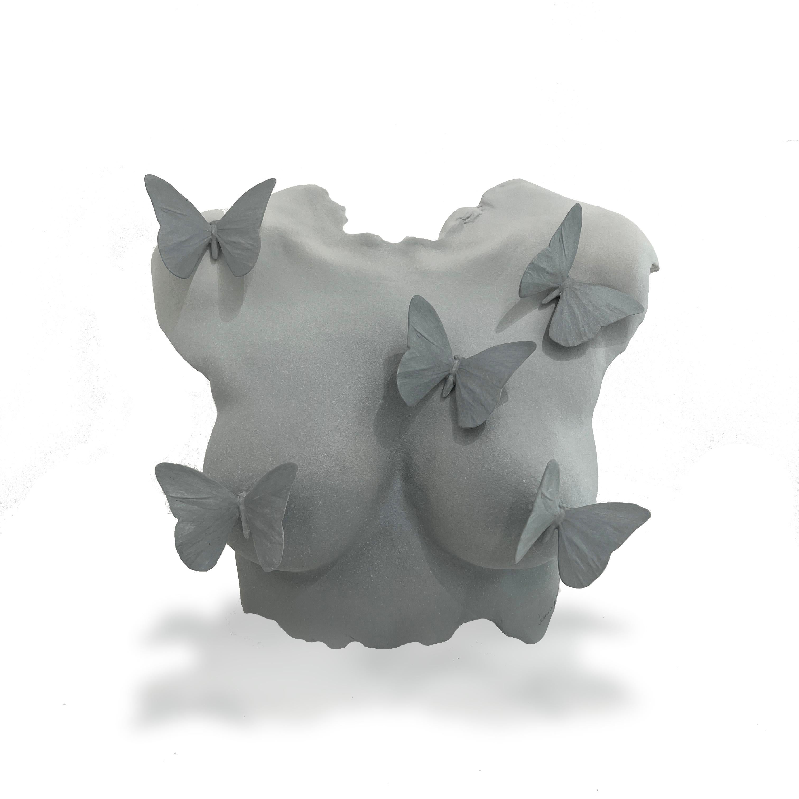 This exquisite freestanding sculpture, measuring 13 inches high and 16 inches wide, and 7 inches deep, is a true work of art. The piece is created with a light grey matte glaze that imbues it with a soft and ethereal quality, elevating the overall