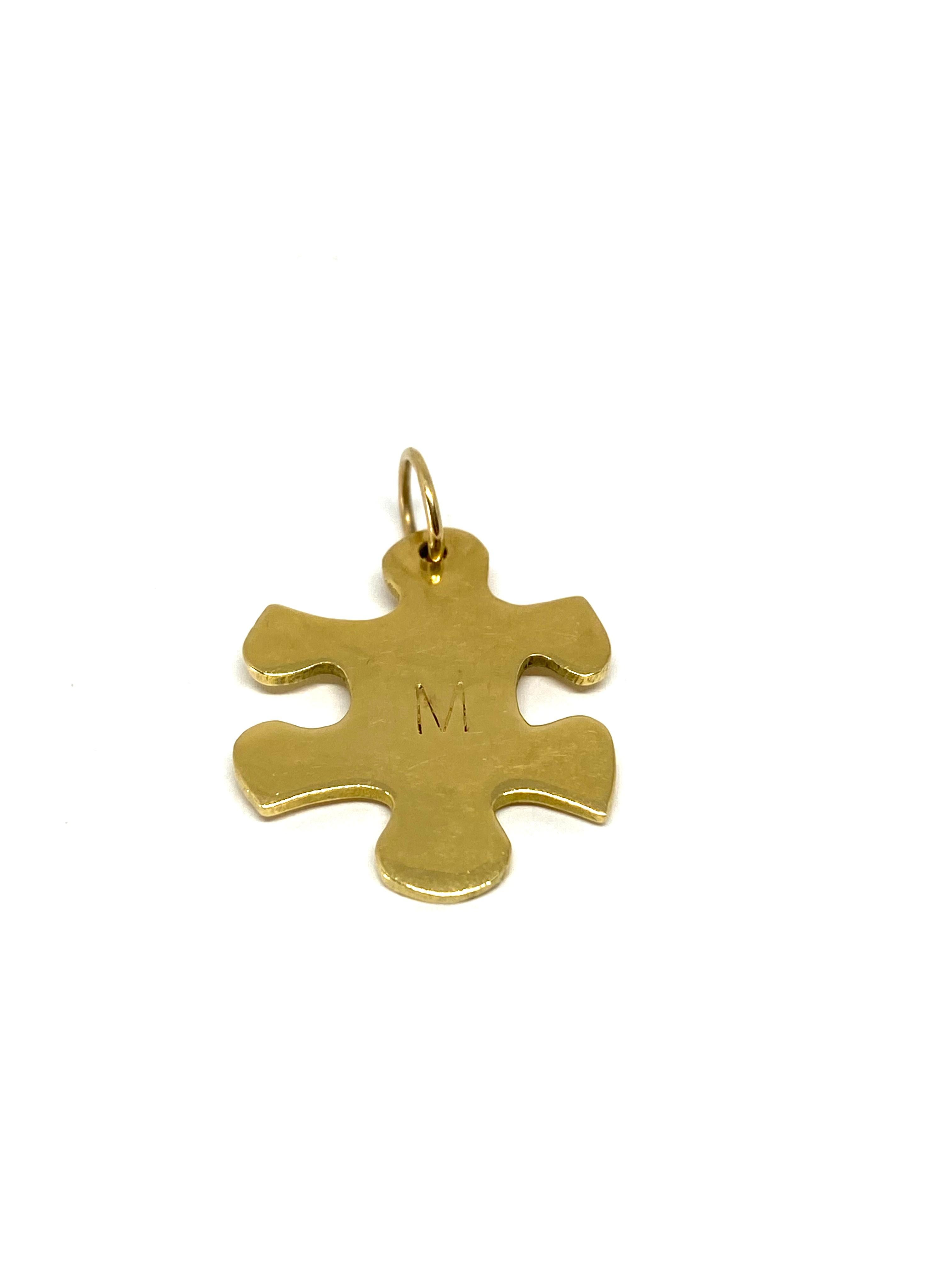 Jennifer Fisher 18k Yellow Gold M Initial Puzzle Piece Charm Pendant

Product details:
750 18K yellow gold
The charm/ pendant shaped in a puzzle piece
Featuring engraved M initial letter on the front
Designer signed on the back JF
Total weight is