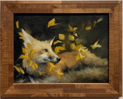 Porträt eines American Fox Cub oder Pup mit dem Wind:: der die Blätter im Herbst durchbrennt