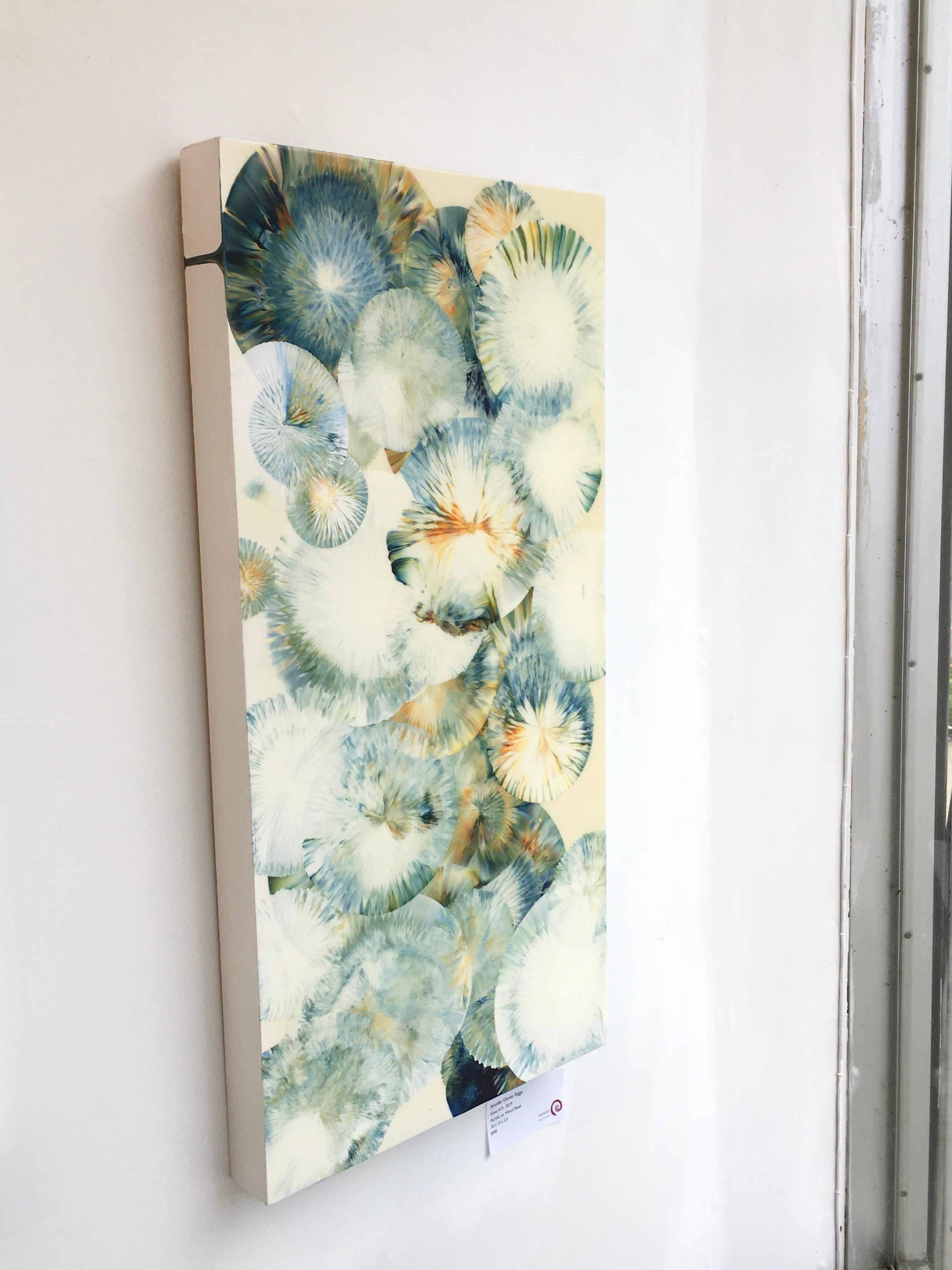 Gaea No 19 by Jennifer Glover Riggs is an acrylic painting with a varnish on Wood.  It is 30 x 15 x 2.5 and can be hung vertically or horizontally.  It has a dynamic burst of color and movement.

Glover Riggs is best known for creating organic