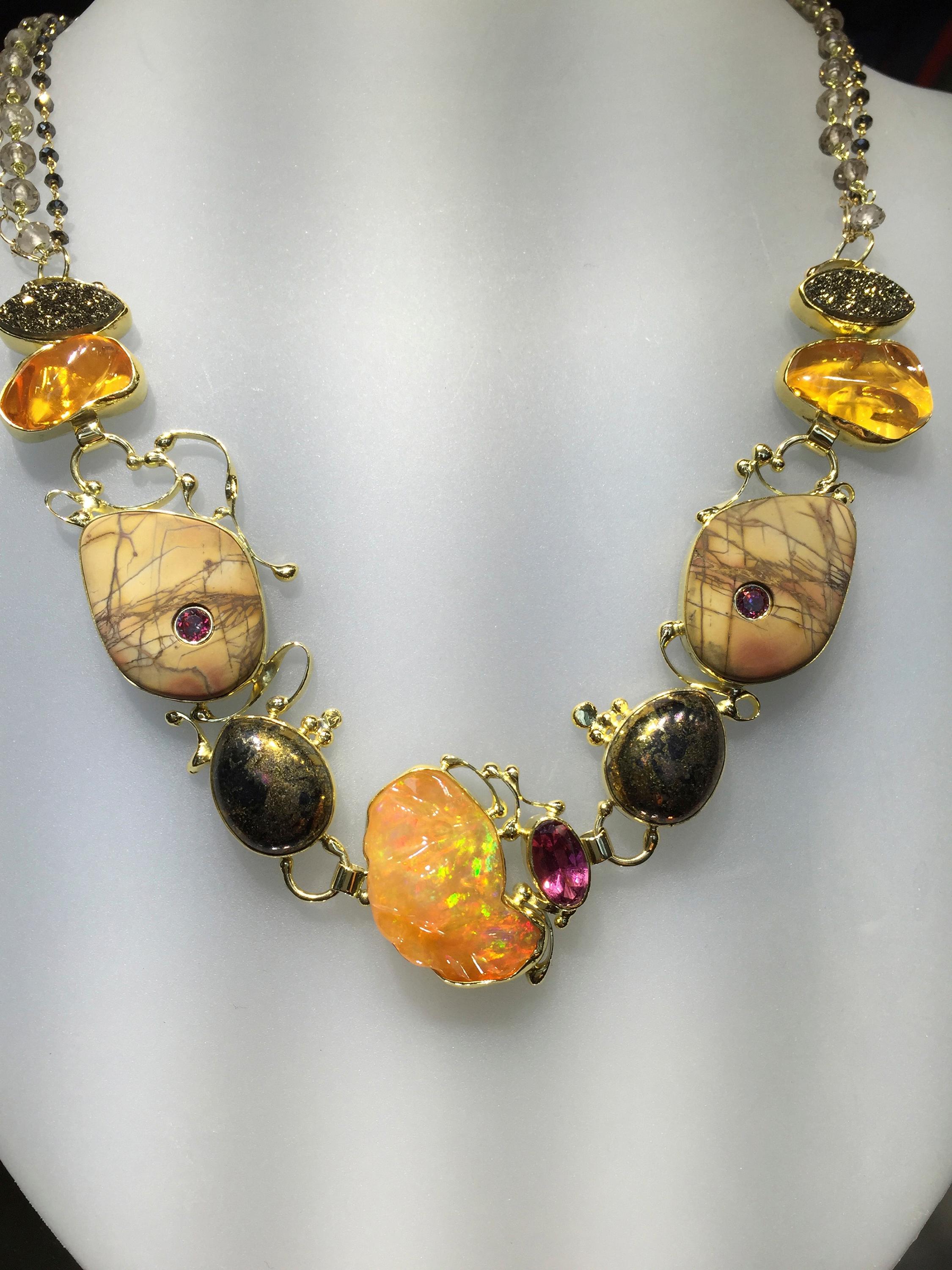 This Mexican opal necklace was such a delight to envision and fabricate. Exploring Mexico, Santa Fe, Yowah & Klimt's paintings with all it's rich colors and shapes led me to this color theme and design. After painting the woman and then