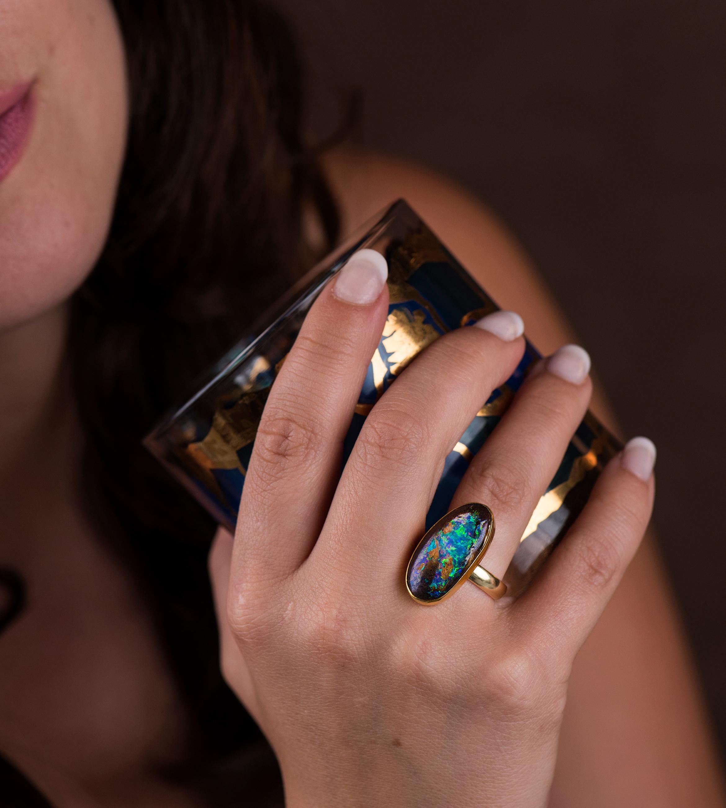 Chocolate matrix petrified wood with opal!  Very cool ring in 22k and 18k gold.  Size 7.5 with a 4mm shank, very comfortable.