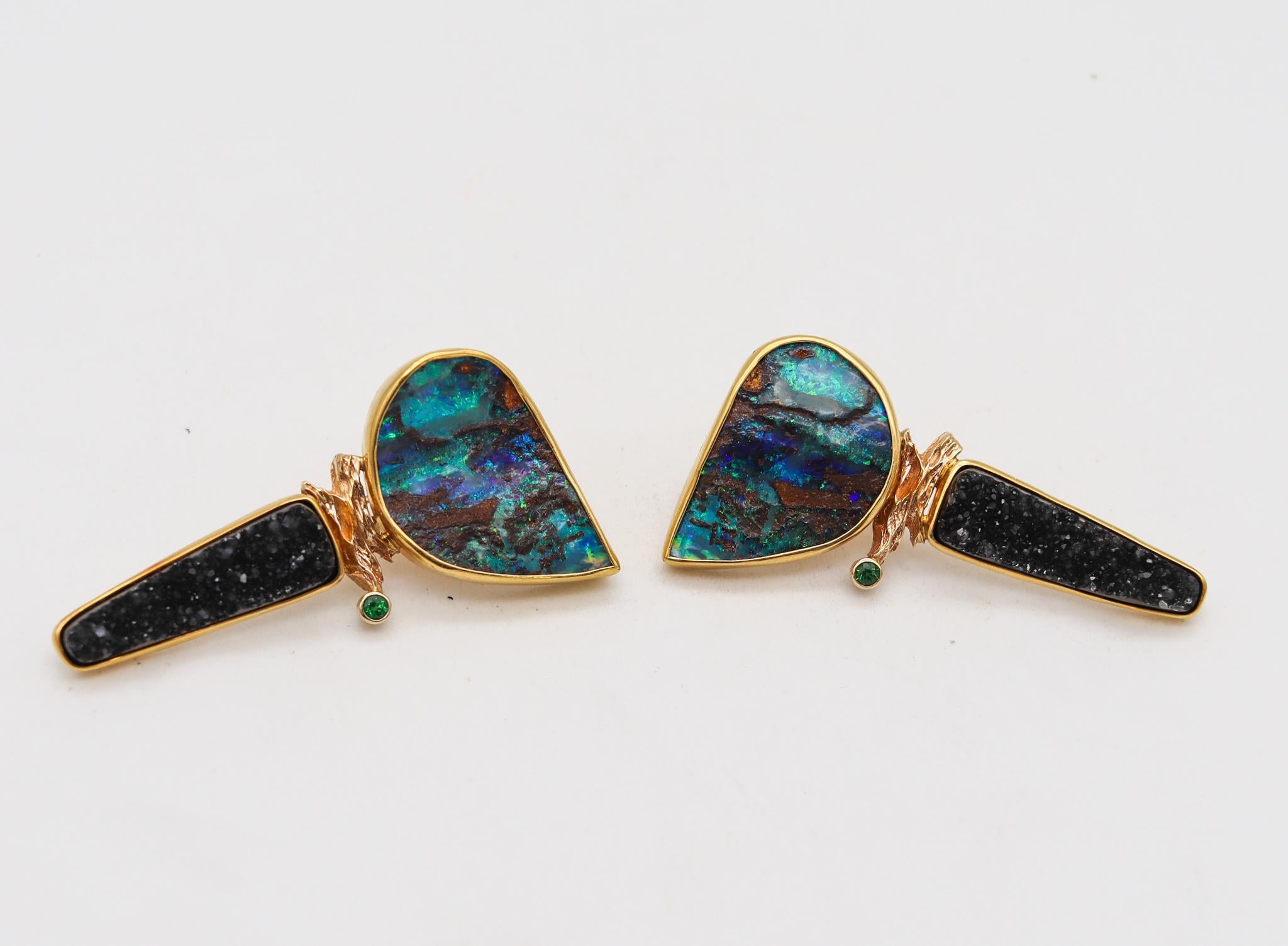 Fabulous pair of drop earrings, created by the artist goldsmith Katherine Kalled at her studio in Welfboro in New Hampshire. These one of a kind earrings has been crafted in solid yellow gold of 18 and 14 karats with textured and polished finish.