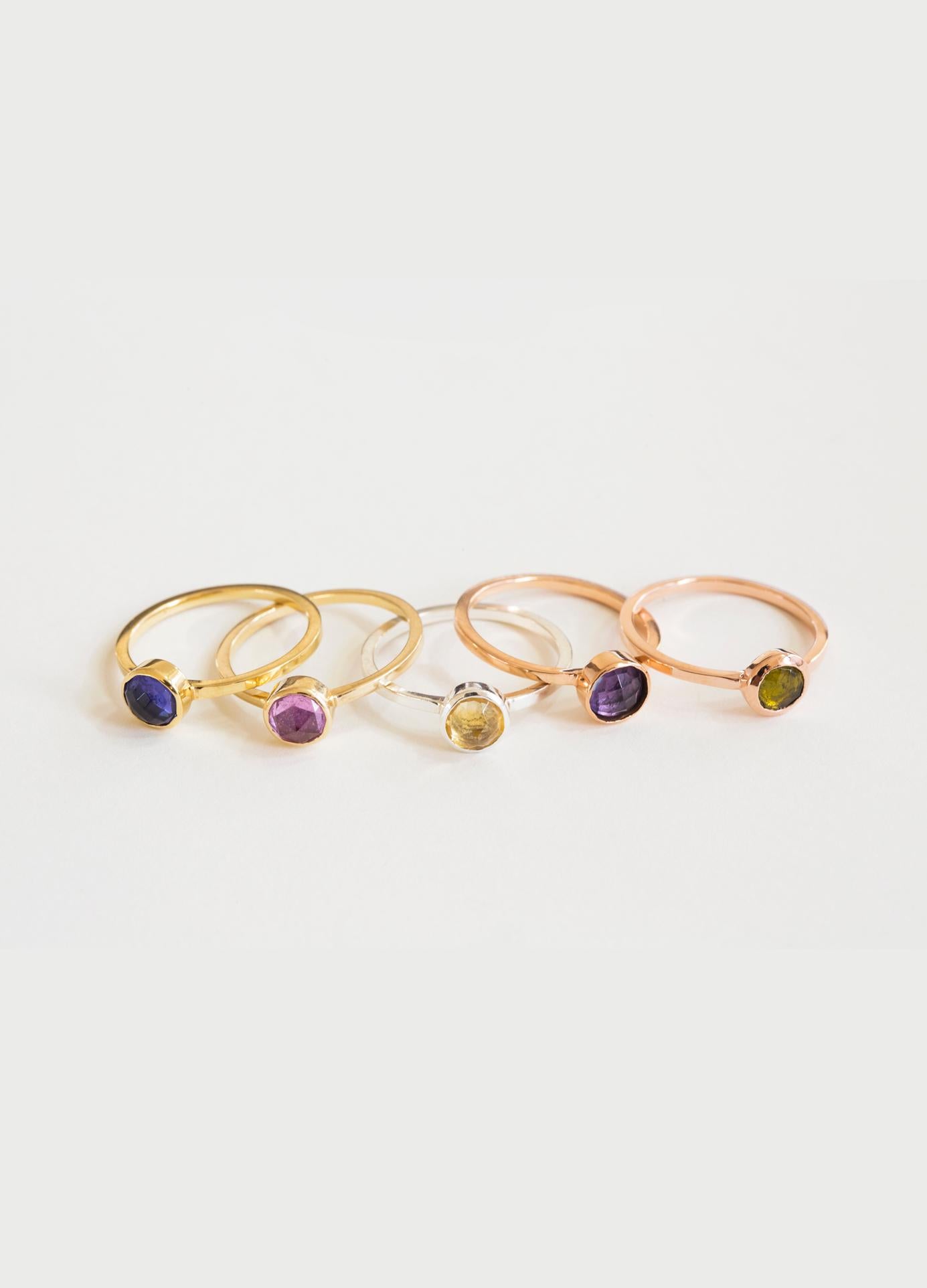 14kt gold stackable gemstone ring with a blue tanzanite stone. 

Additional gemstone and band size options available upon request. 

Due to the unique quality of our hand picked stones, no two stones are identical.
