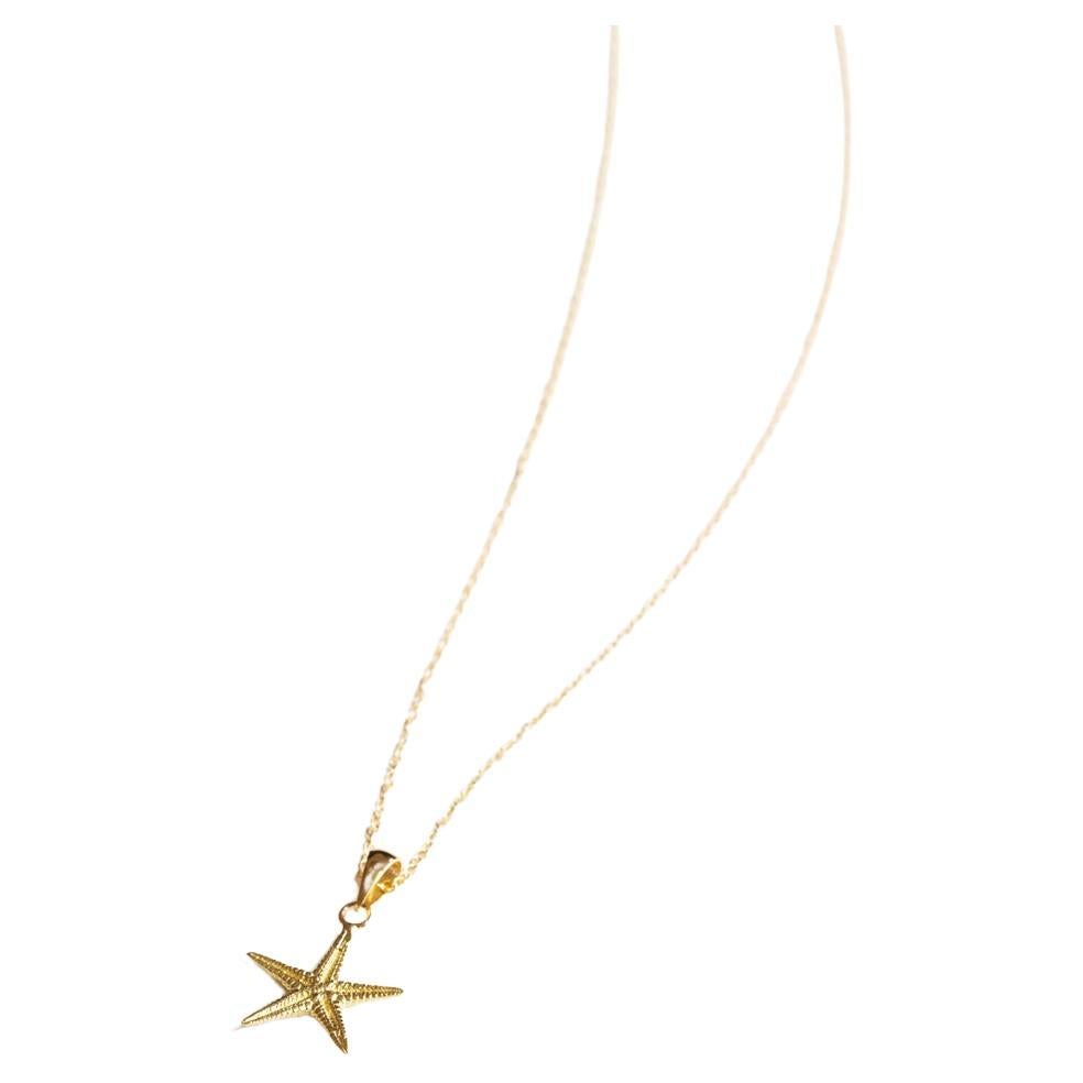 Jennifer Liang, petite breloque étoile de mer en or 14 KT