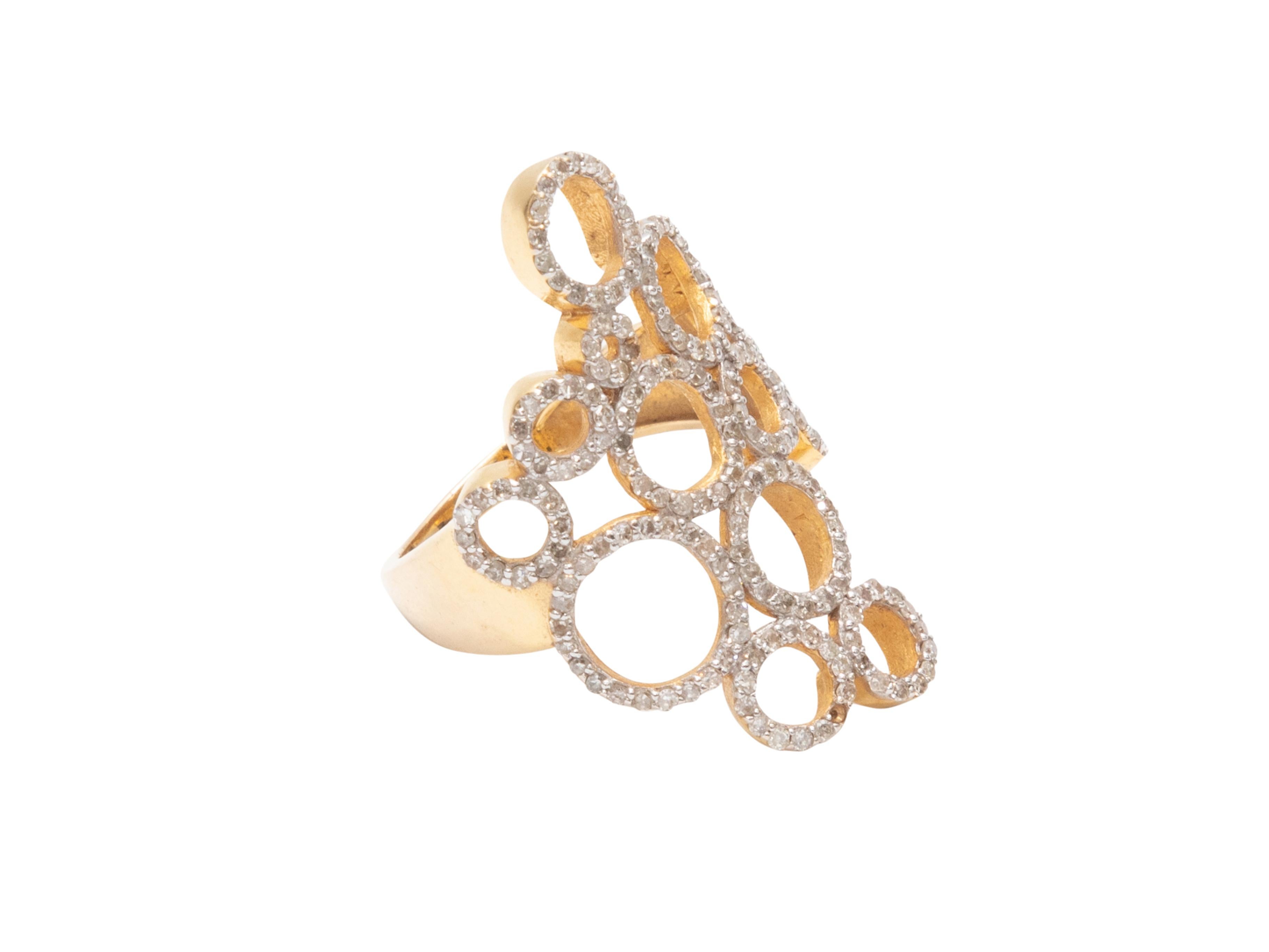 Product Details: Gold and pave diamond circles ring by Jennifer Miller. Designer size 7.

Condition: Pre-owned. Very good.

Please note this is a pre-owned item that may display signs of wear consistent with the condition listed above and shown in