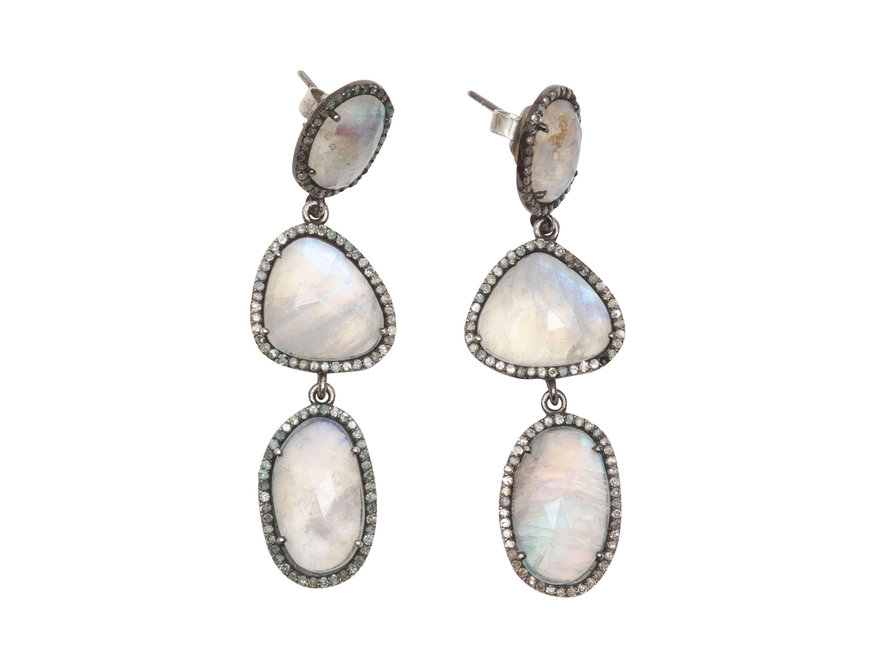 Product Details: Silver and moonstone drop pierced earrings by Jennifer Miller. Pave trim throughout. Butterfly back closures. 2.5