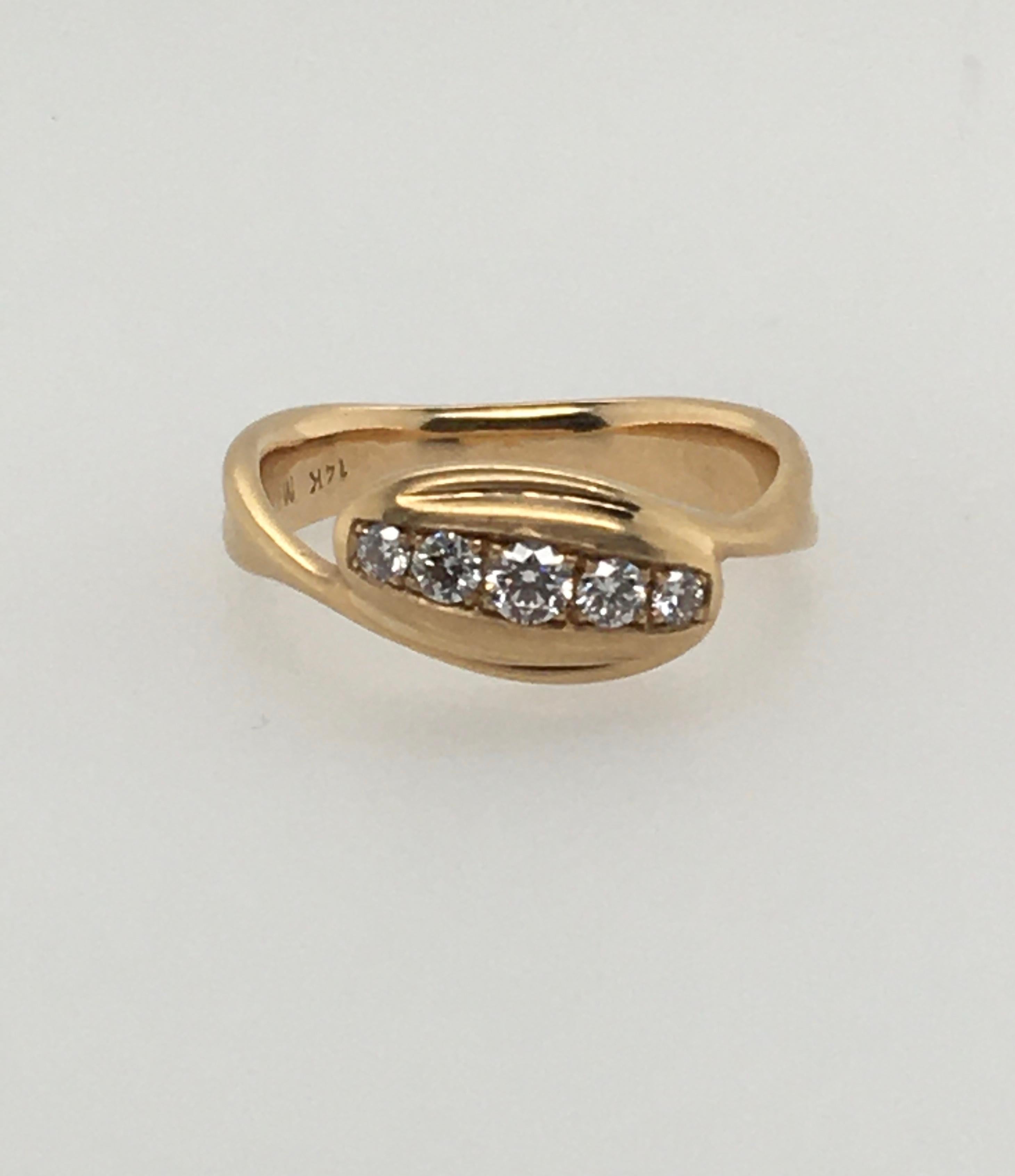 gold ring with embedded diamond