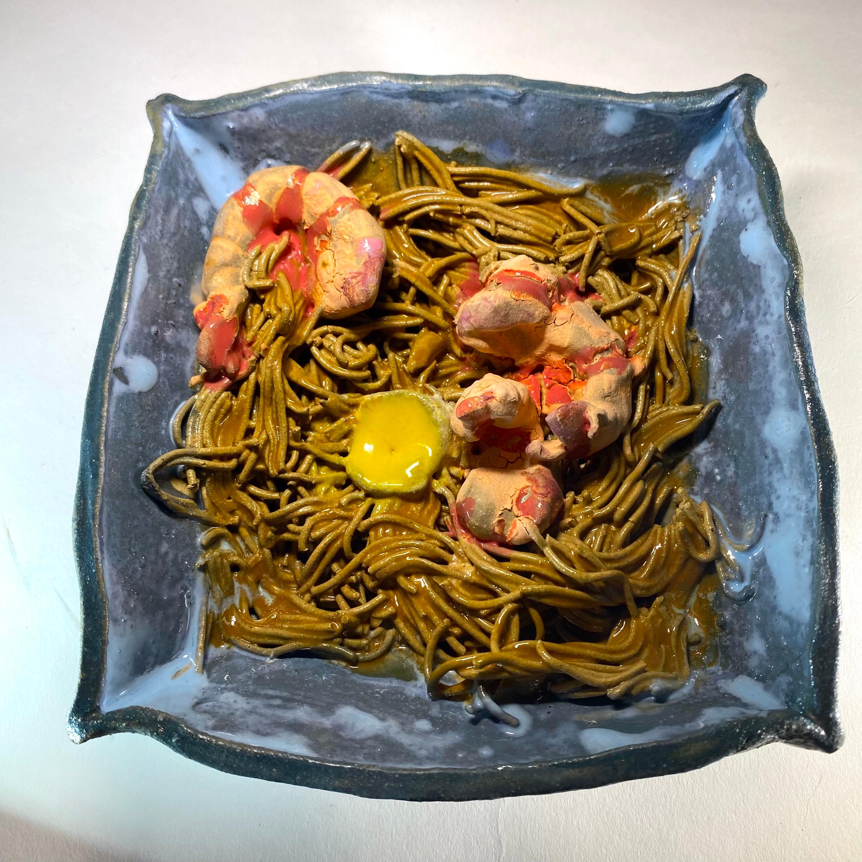 Jenny Day creates intricate sculptures of foods that stir memories of personal and community events. Whether a summer party, homemade dinner, or crawfish boil, these gatherings remind us of the significant occasions that have shaped our values