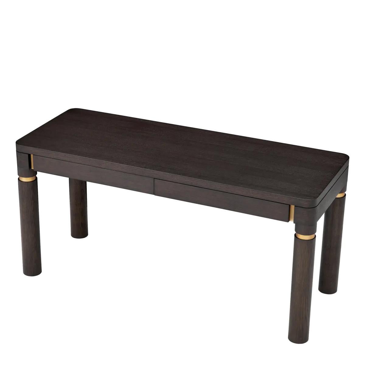 Desk Jenny with structure in wood in oak veneer in moka 
finish and with stainless steel details in brushed brass finish.
Desk with 2 drawers, desk top thickness : 13cm.


