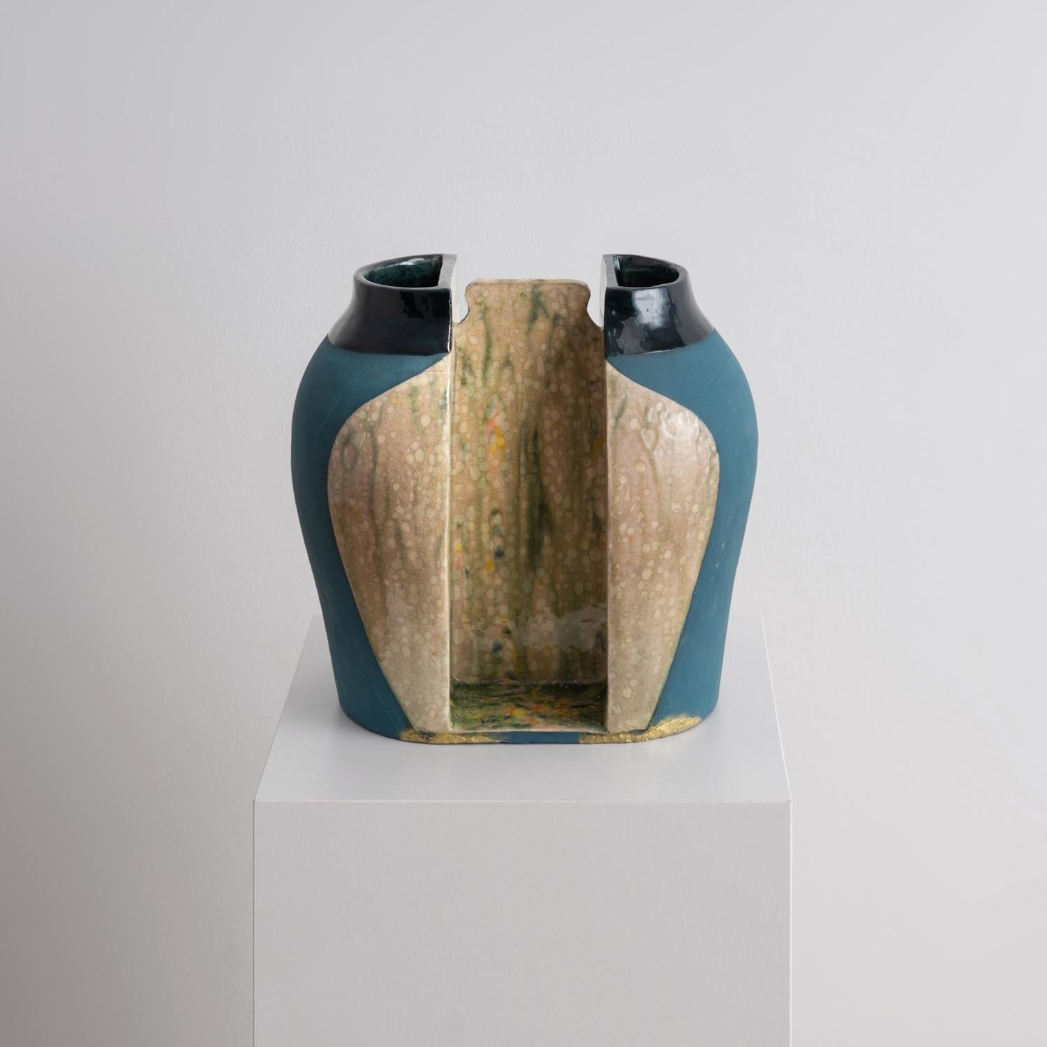 Contemporary Glazed Stoneware & Kintsugi Vessel, entitled 'She, Of Unknown Origin', by Los Angeles-based artist and curator Jenny Hata Blumenfield. 

Mirroring halves of matte peacock-blue with a glossy midnight-blue rim surround the form of a