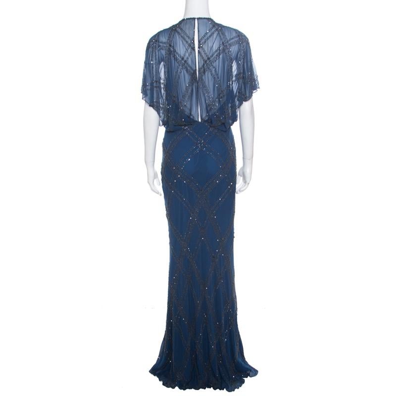 Beautifully embellished with crystals and beads creating an elegant embroidery all over, this breathtaking gown from Jenny Packham is ideal for special events. The floor-grazing length and gorgeous blue color combine to make it as sophisticated as