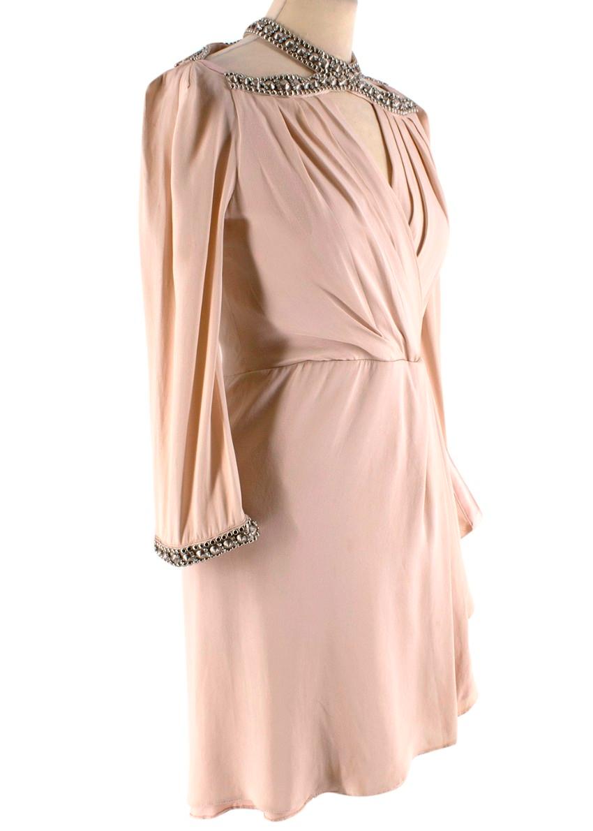 Jenny Packham blush crystal studded halter neck dress

- Long sleeved 
- Hook fastened cuffs 
- Invisible back zip fastening 
- Cut out neck detail
- Silver embellishment details  
- Mini length 

Materials:
Shell:
- 100% Silk 
Lining:
- 100%