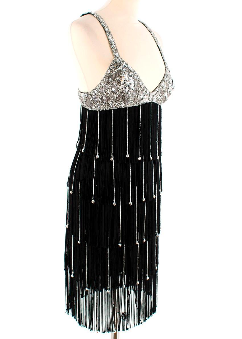 Jenny Packham Black Embellished Flapper Dress

- Highly embellished straps and top area
- Sequins beads and diamante's
- Flapper style tassels in black with silver beaded detail
- Hidden zip up the side 

Materials 
100% Polyester
lining 
100%