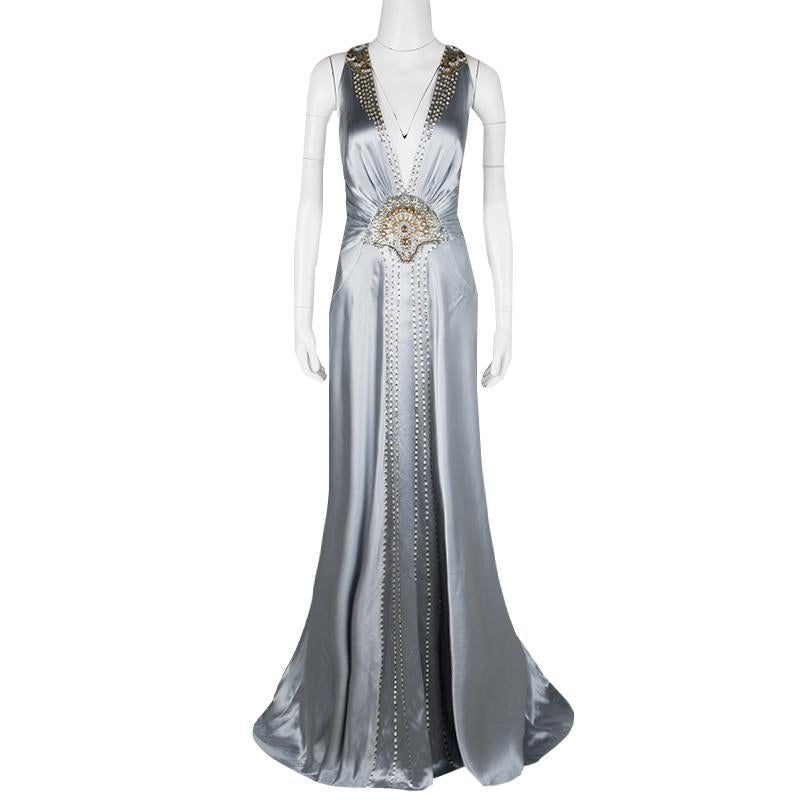 Create the most stunning red carpet looks wearing this gorgeous Jenny Packham evening gown that is fit for a diva. Constructed in grey silk satin fabric, this gown features embellishments with beads, stones and sequins all through the front and