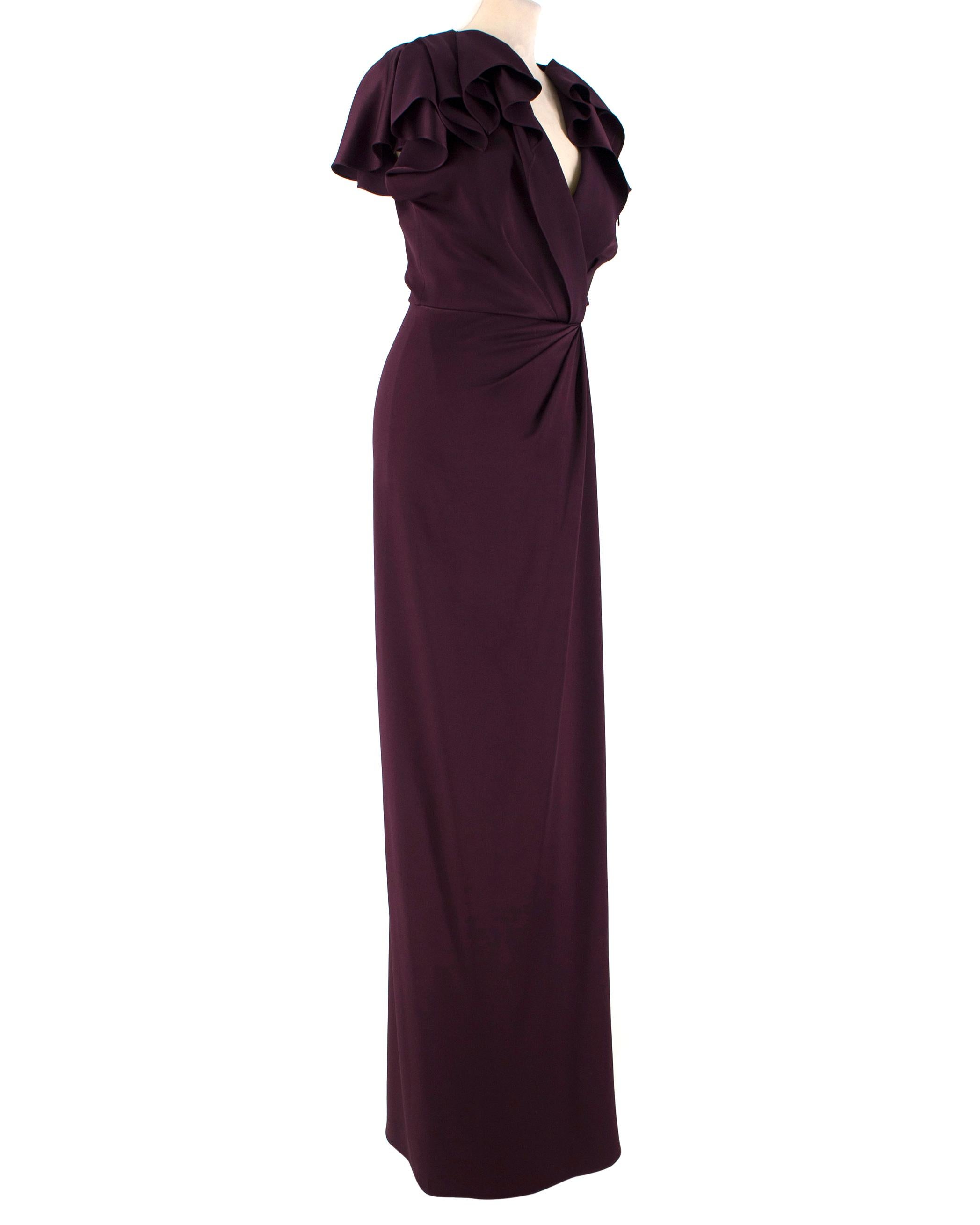 Jenny Packham Ruffle-Front Purple Gown

-Purple gown with ruffle details at the shoulder
-Gathered pleats at waist
-High slit
-Back zip closure
-Interior attached top slip with adjustable straps

Please note, these items are pre-owned and may show
