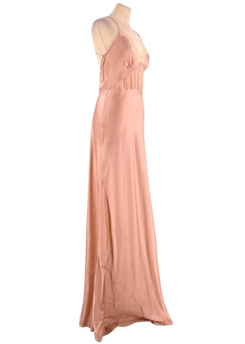 Jenny Packham Silk Pink Slip Gown

-Silk pink gown
-Blush lace trim with crystal embellishment
-Spaghetti straps with racerback
-Ruched around bust

Please note, these items are pre-owned and may show signs of being stored even when unworn and