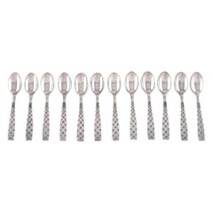 Jens H. Quistgaard, Denmark, 12 Star Teaspoons in Plated Silver