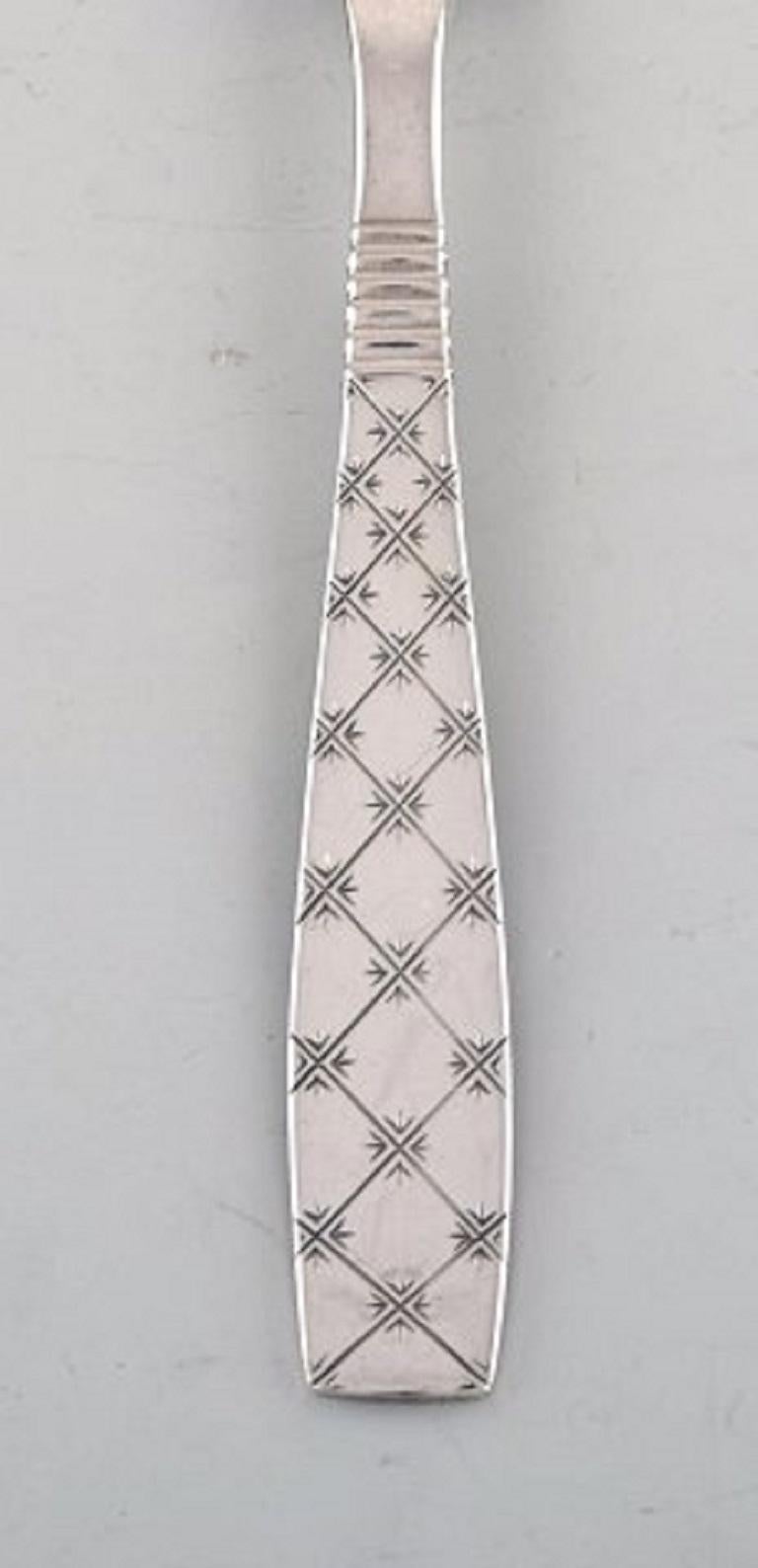 Jens H. Quistgaard, Denmark, Eight Star Dessert Spoons For Sale at 1stDibs