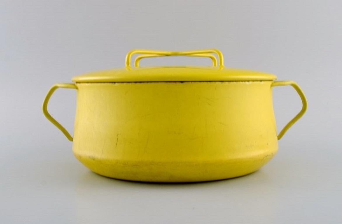 Jens H. Quistgaard (1919-2008), Denmark. Lidded pot in bright yellow enamel. 
1960s.
Measures: 30 x 13 cm.
In excellent condition with signs of use.
Stamped.