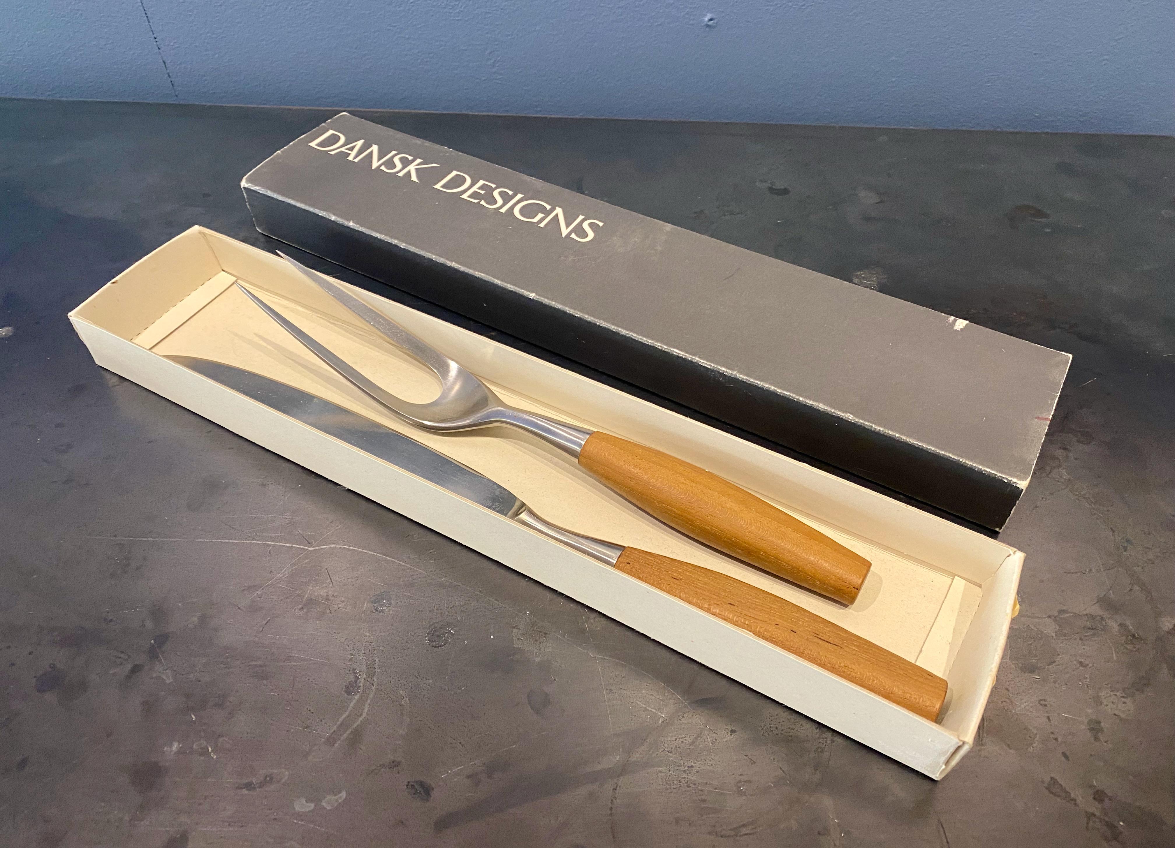 The Fjord flatware was designed in 1953 and produced in co operation with an American businessman under the label Dansk design. The flatware was originally manufactured in Germany. Stainless steel and teak. A modern design icon which found its way