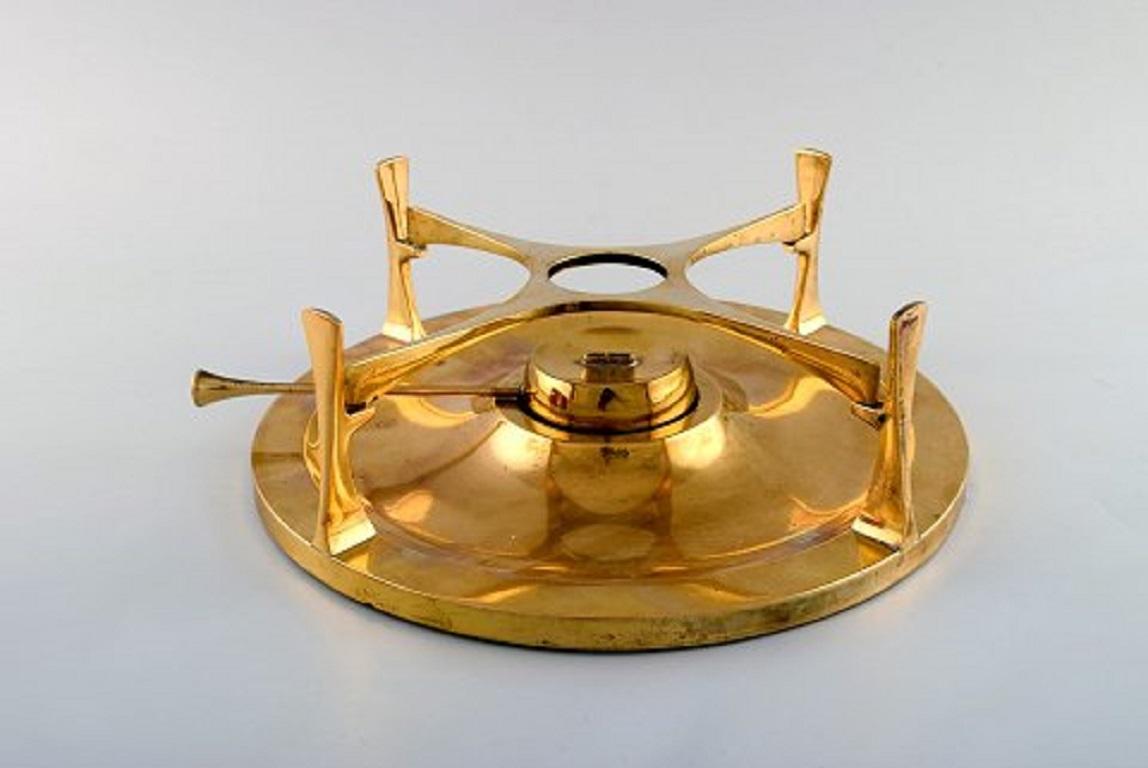 Jens H. Quistgaard. Fondue pot in brass and copper pot on stand with burner.
Measures: 29 x 19.5 cm.
In very good condition. Minor wear.
Stamped.