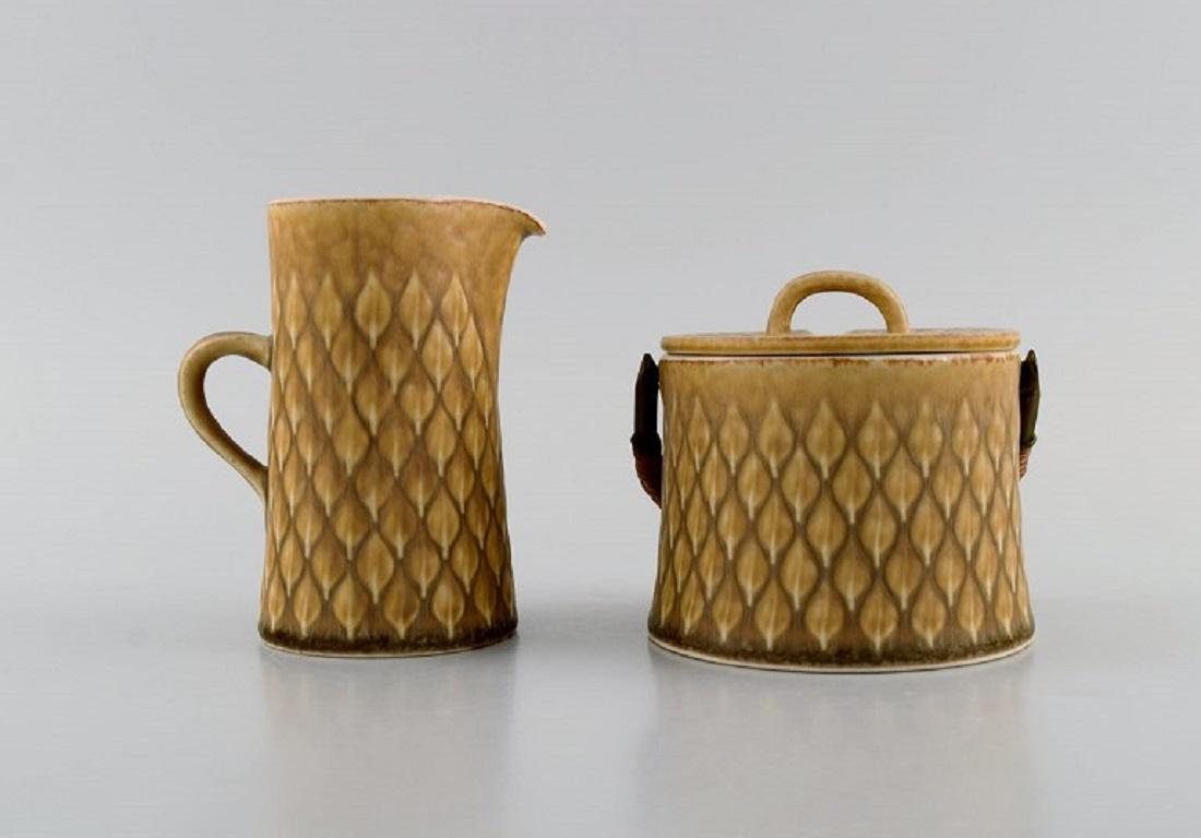 Mid-20th Century Jens H. Quistgaard for Bing & Grøndahl, Relief Tea Service in Glazed Stoneware For Sale