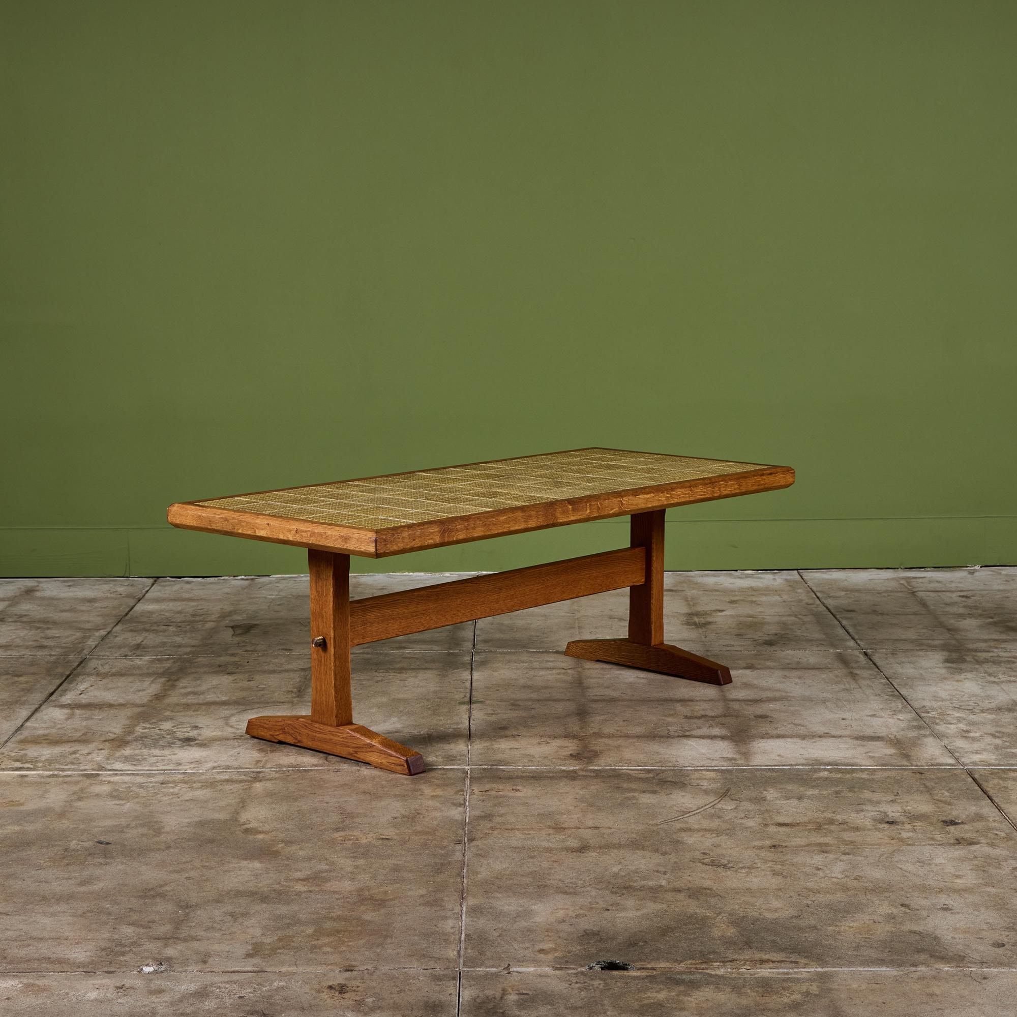 Rectangular coffee table by Jens H. Quistgaard for Richard Nissen, c.1950s Denmark features a hand-oiled oak frame with Azur tile inlay along the table top. The tile pattern is one of Quistgaard's most famous designs used on a variety of his ceramic