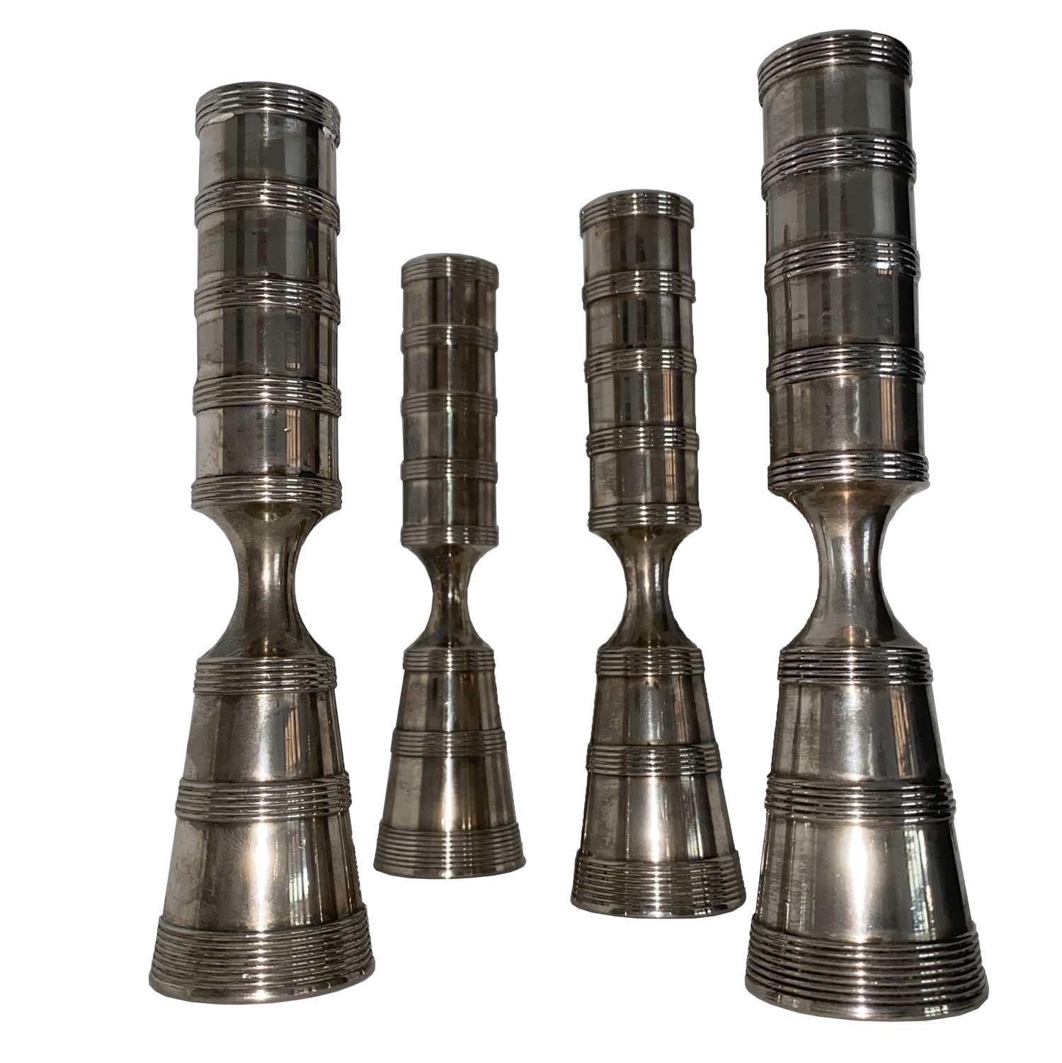 Mid-Century Modern Jens H Quistgaard set of 4 candlesticks in silver metal For Sale