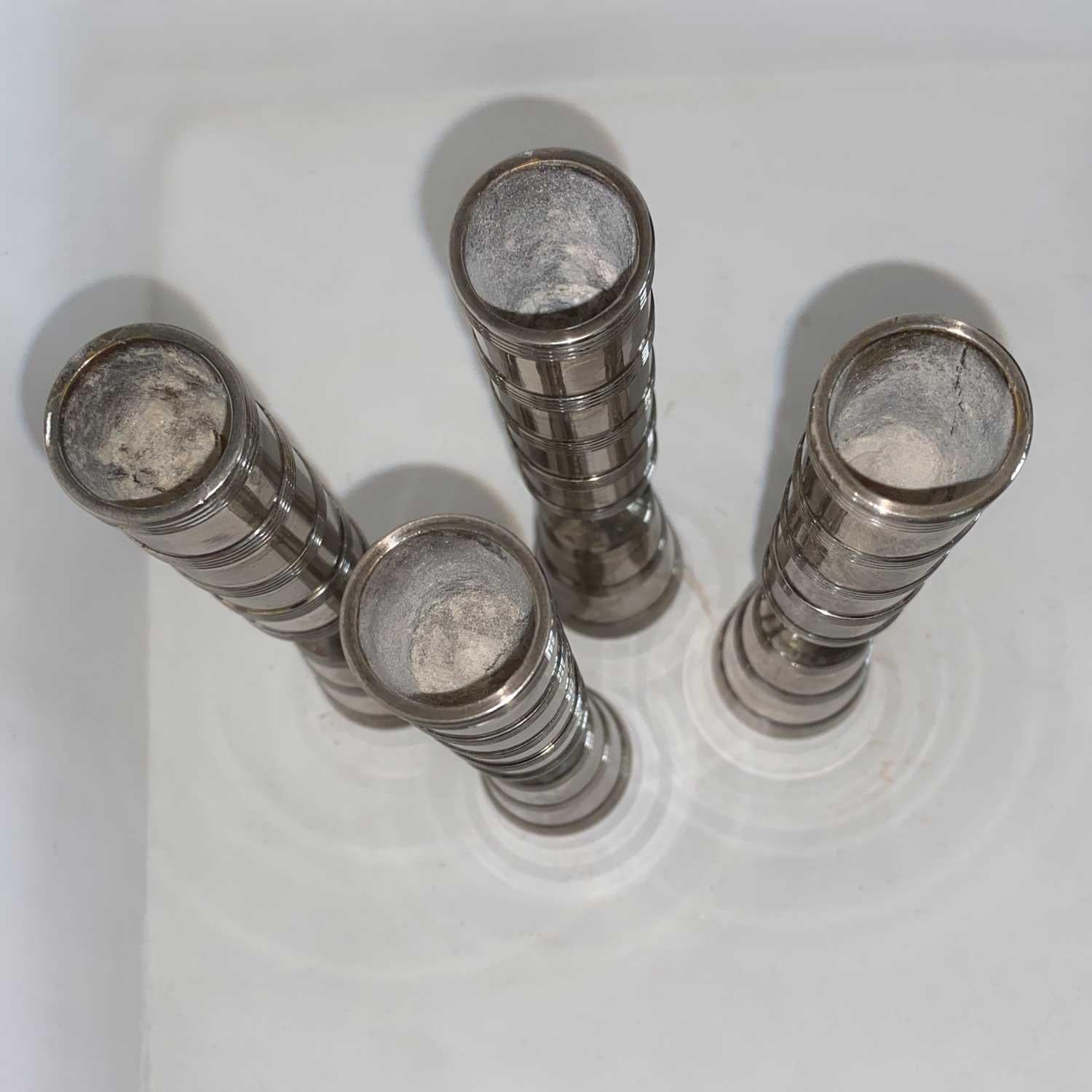Danish Jens H Quistgaard set of 4 candlesticks in silver metal For Sale