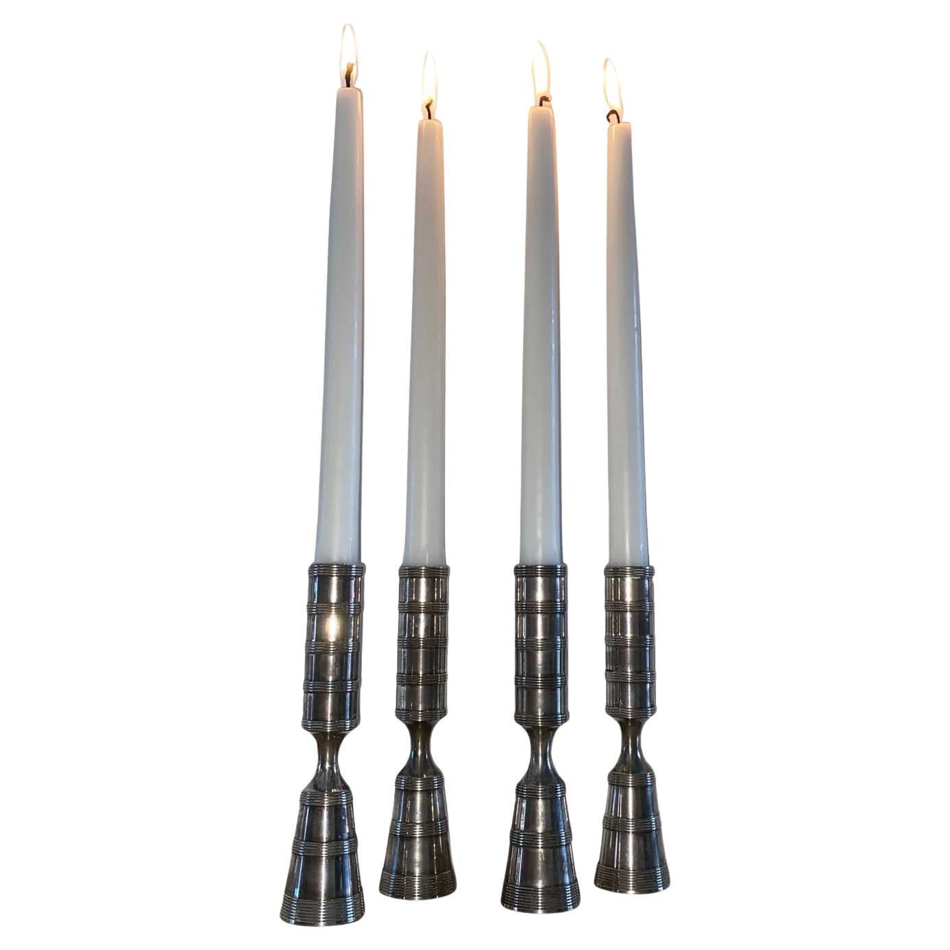 Jens H Quistgaard set of 4 candlesticks in silver metal For Sale