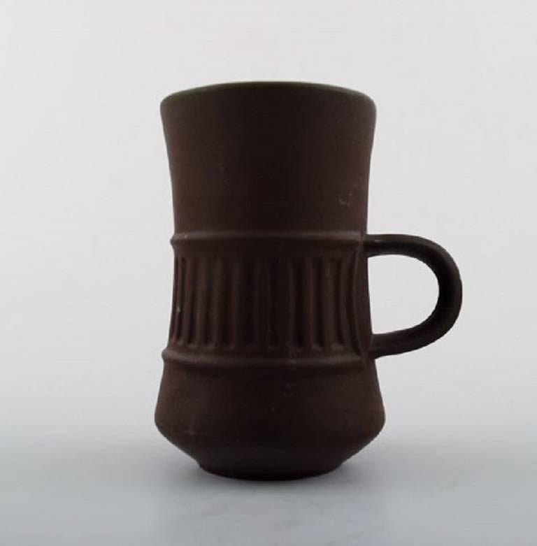 Jens H. Quistgaard, Flammenstein, neun Kaffee- / Mocha-Tasse mit Untertassen (Skandinavische Moderne) im Angebot