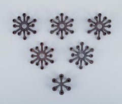 Jens Harald Quistgaard for Dansk Designs. Set of six candle holders in cast iron