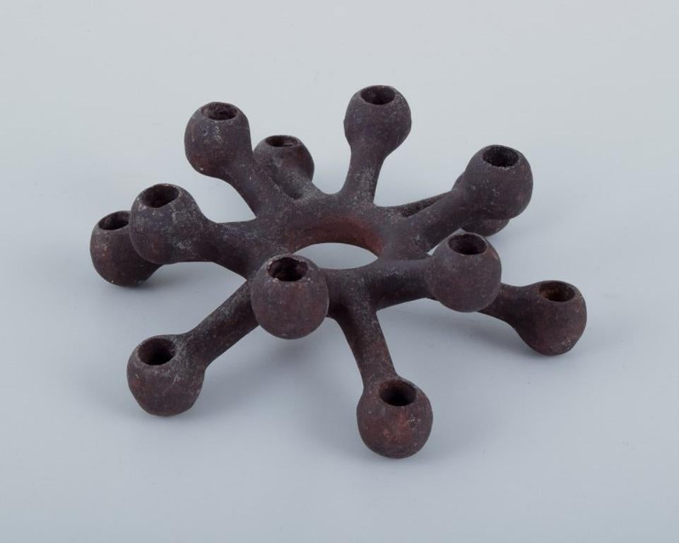 Danish Jens Harald Quistgaard for Dansk Designs. Set of six candle holders in cast iron For Sale