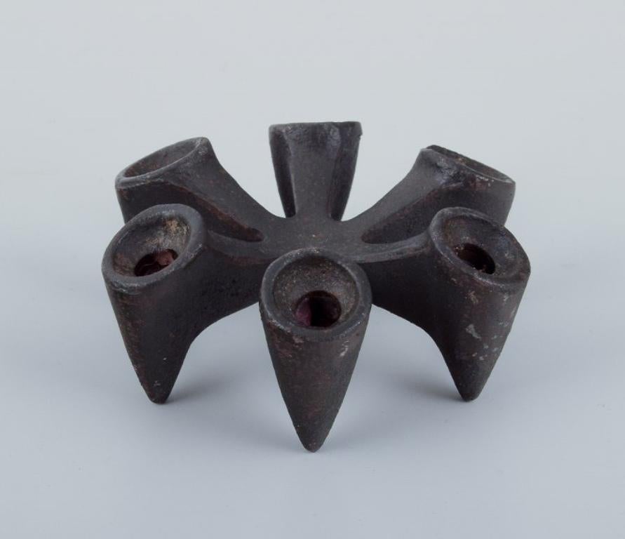 Cast Jens Harald Quistgaard for Dansk Designs. Set of six candle holders in cast iron For Sale