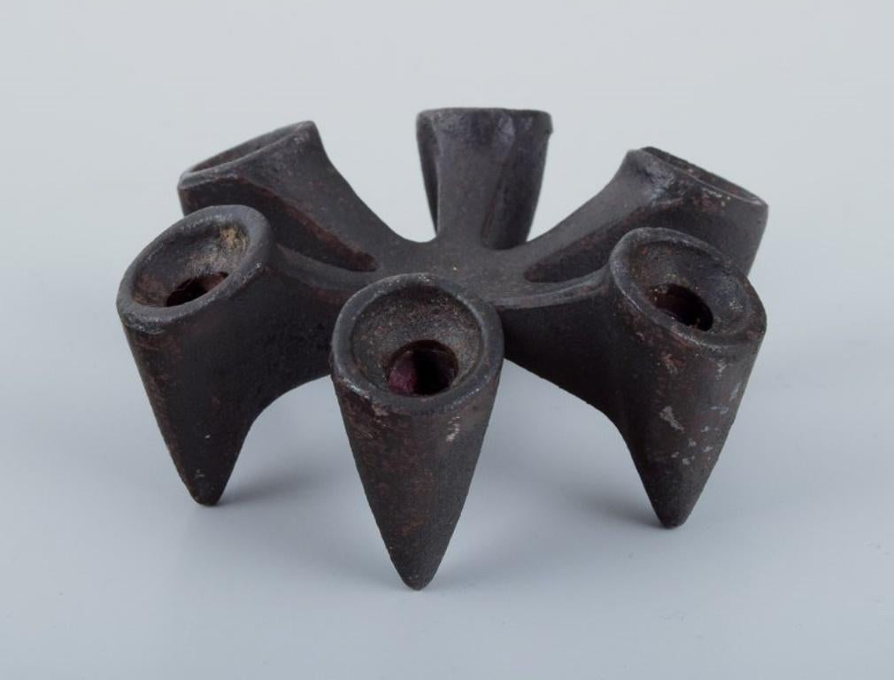 Mid-20th Century Jens Harald Quistgaard for Dansk Designs. Set of six candle holders in cast iron For Sale