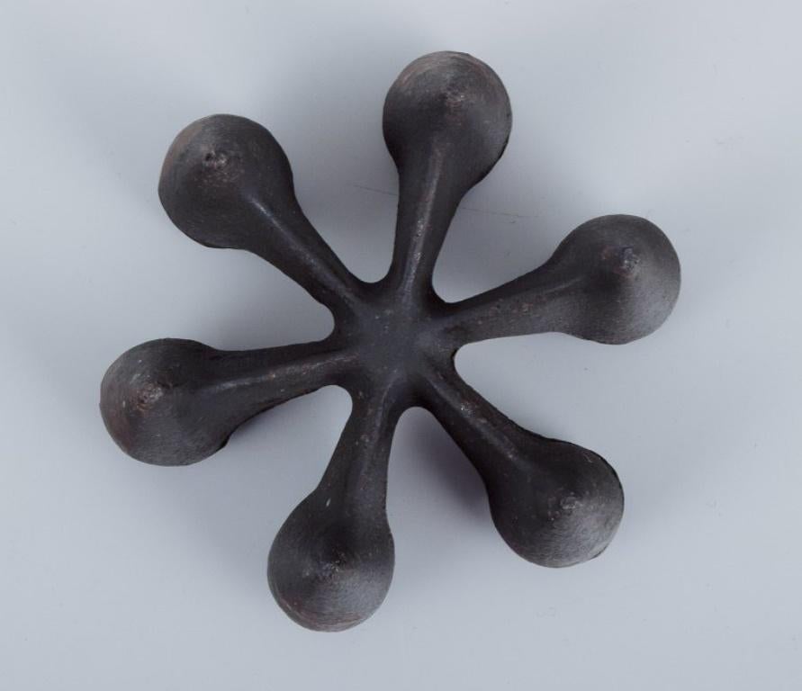 Iron Jens Harald Quistgaard for Dansk Designs. Set of six candle holders in cast iron For Sale