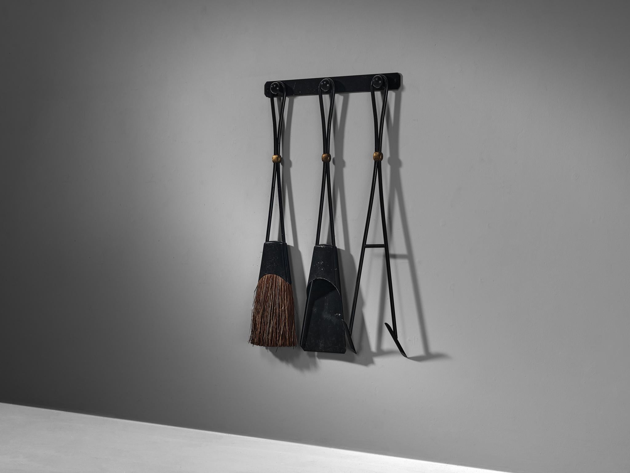 Jens Harald Quistgaard, fireplace set, model '1400', forged iron, brass, straw, Denmark, circa 1965.

Danish sculptor and designer Jens Harald Quistgaard (1919-2008) is particularly known for designing kitchenware and tableware. Although consisting