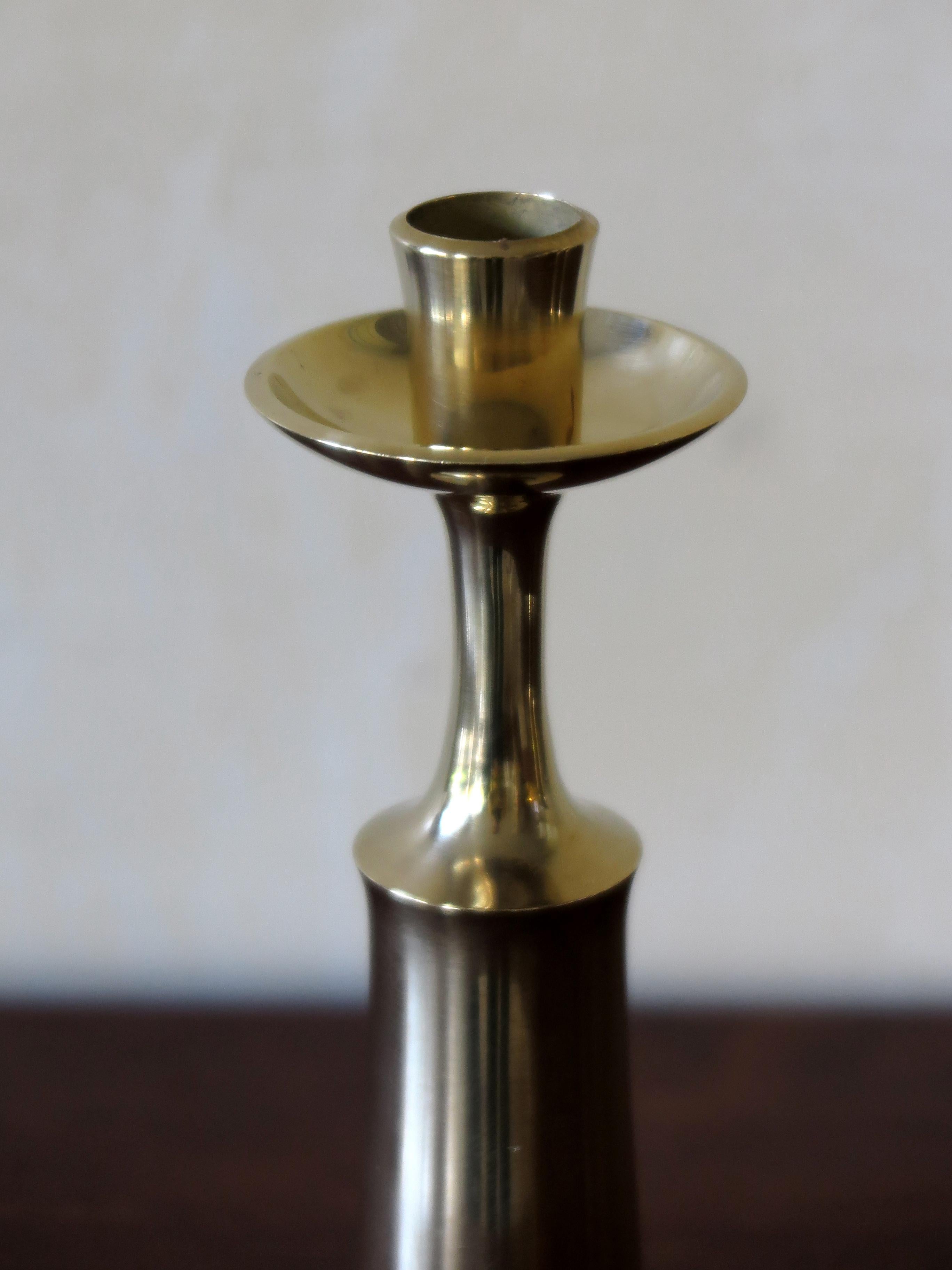 Brass Mid-Century Modern candlestick designed by Jens Harald Quistgaard for Dansk Design, Denmark, circa 1950.
Manufacturer and designer brand engraved inside.
Please note that the item is original of the period and this shows normal signs of age