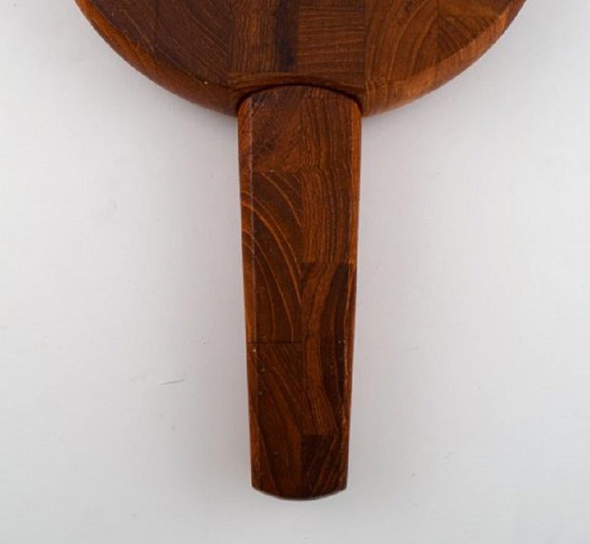 Scandinavian Modern Jens Harald Quistgaard. Teak wood cutting board with built-in knife. For Sale